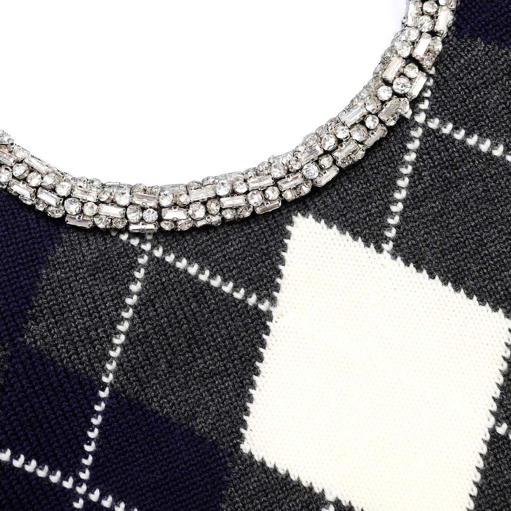 A close up of the fabric for the Grey Argyle Crystal Trim Jumper