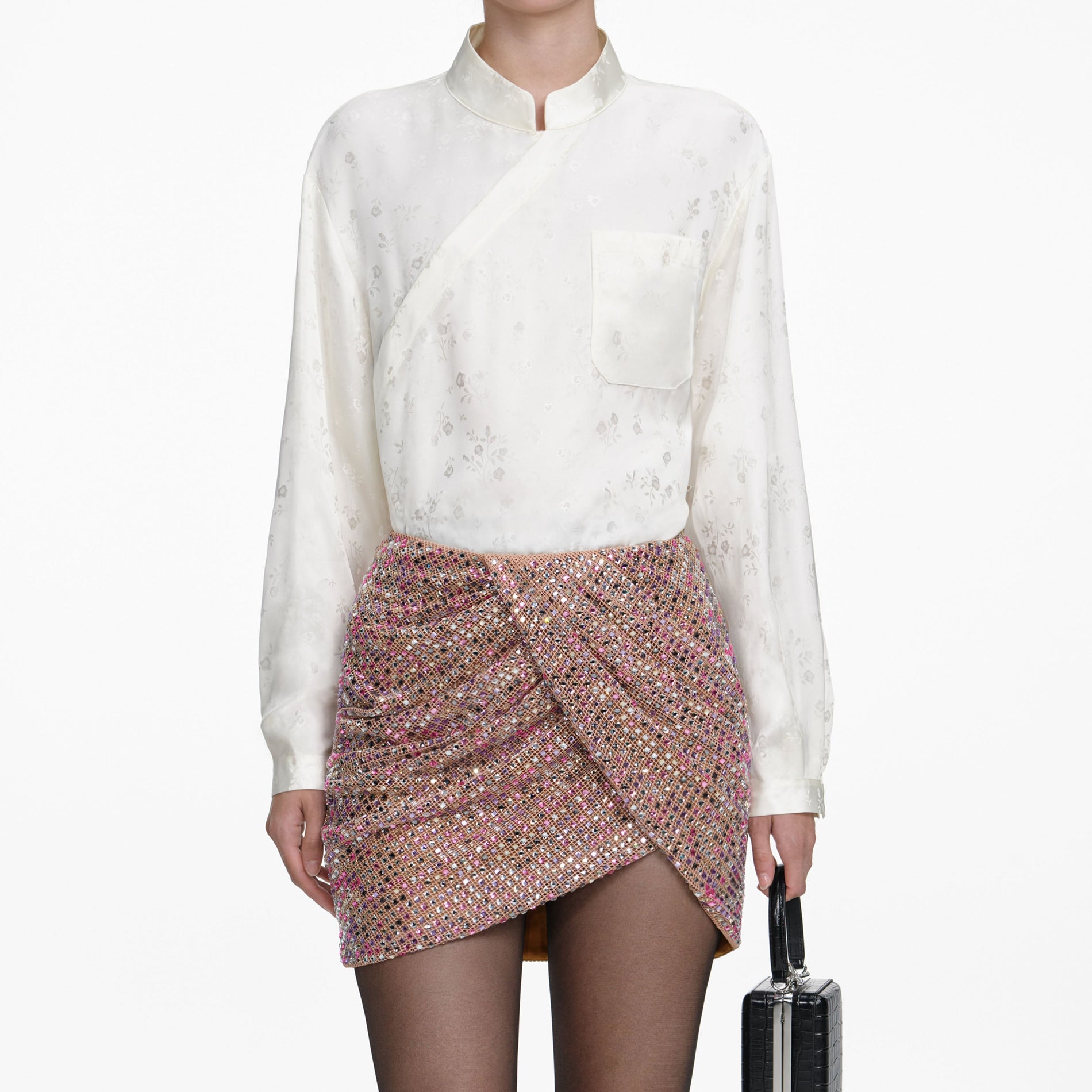 A close up of a woman wearing the Cream Satin Jacquard Blouse