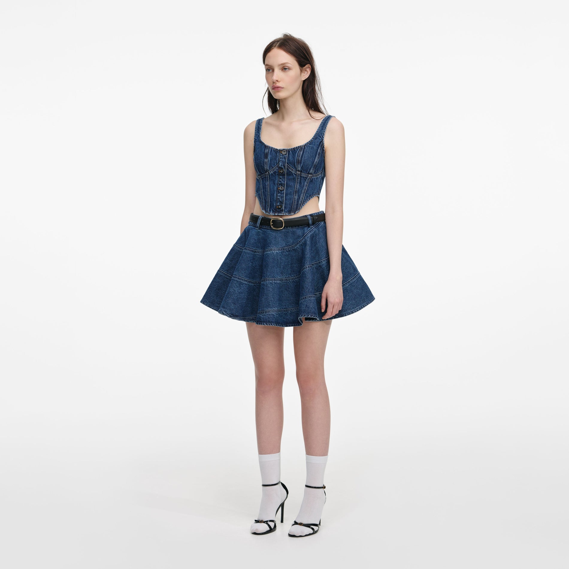 Side view of a woman wearing the Denim Corset Top