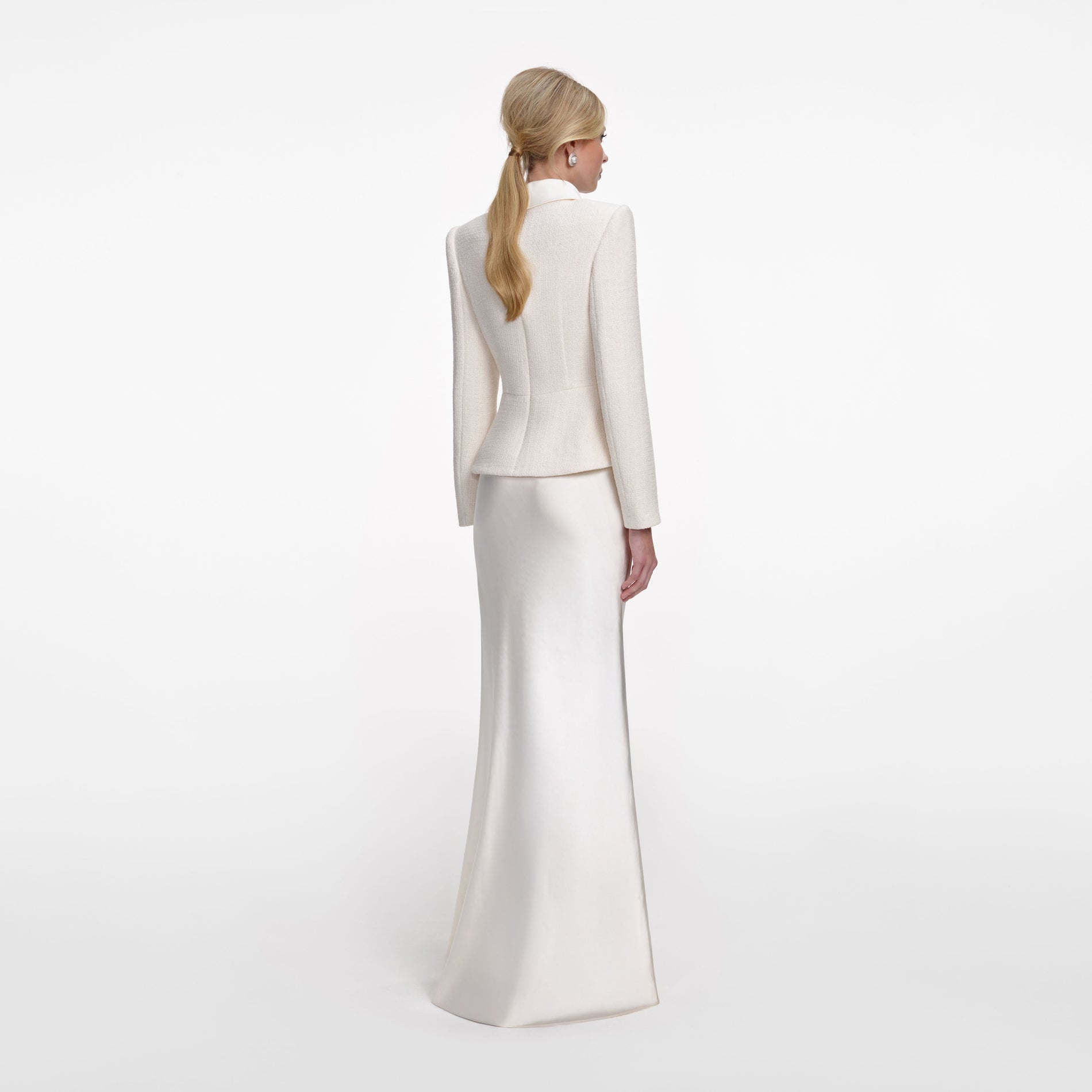 Back view of a woman wearing the Cream Boucle Collared Maxi Dress