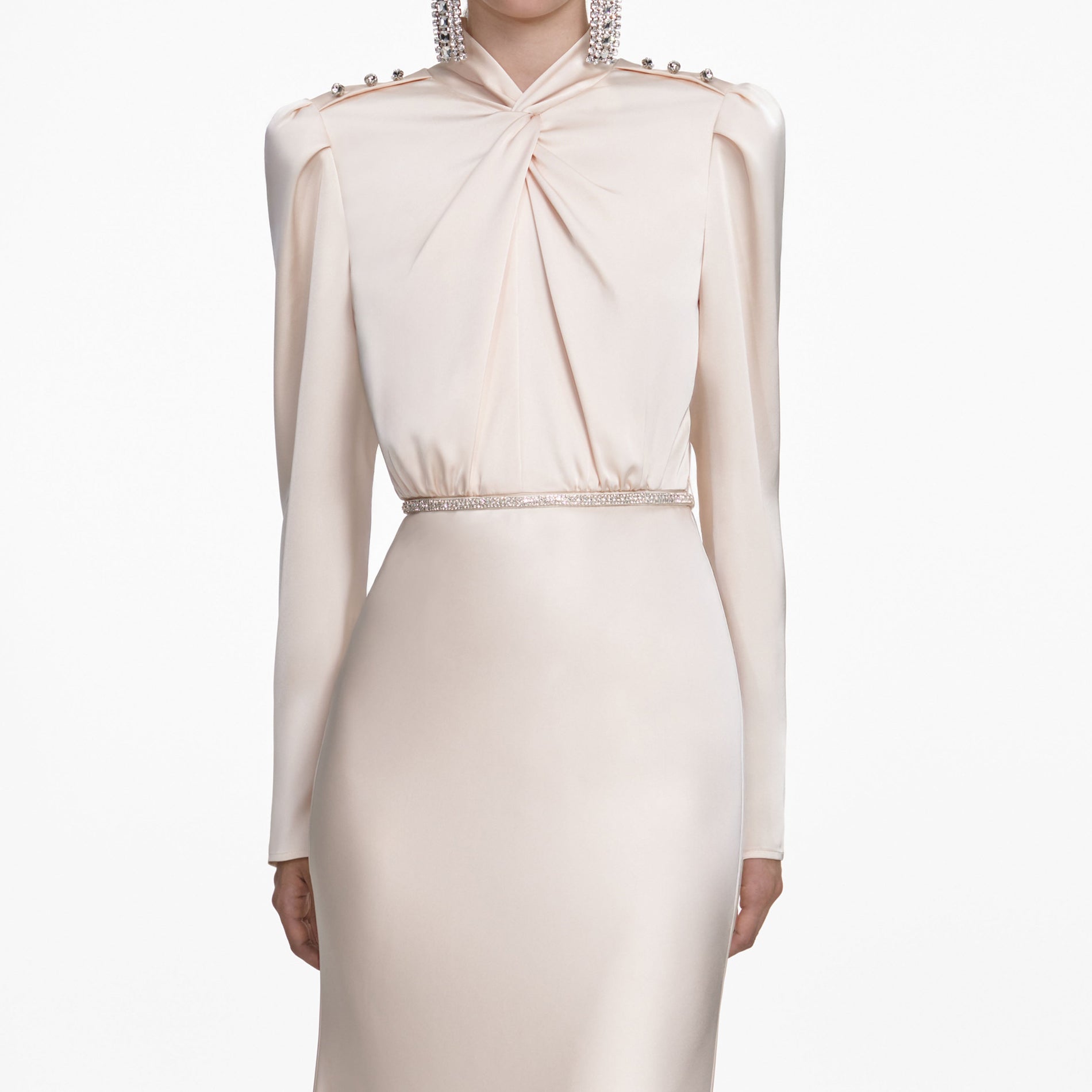 A close up of a woman wearing the Champagne Satin Maxi Dress