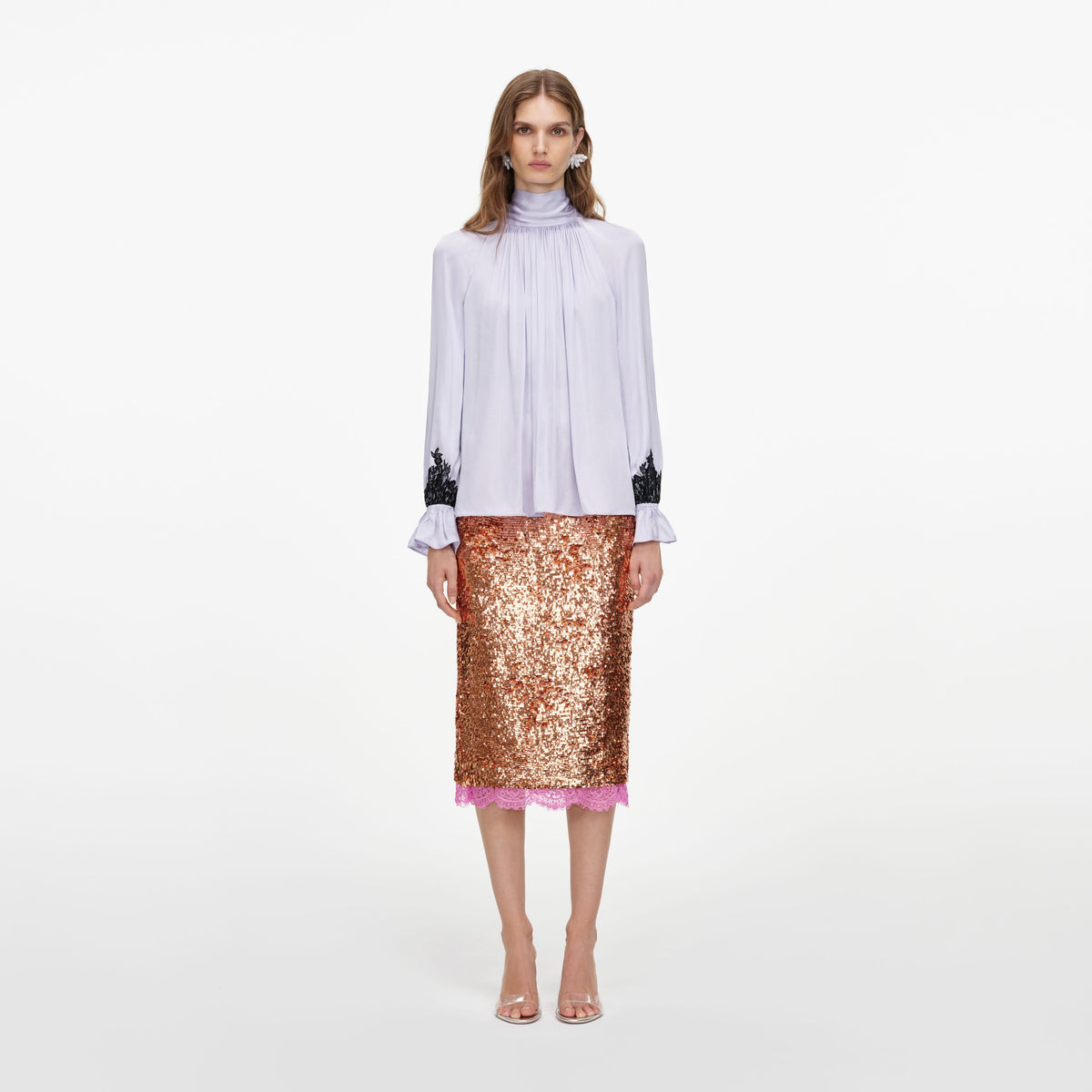 Front view of a woman wearing the Lilac Viscose Contrast Lace Blouse