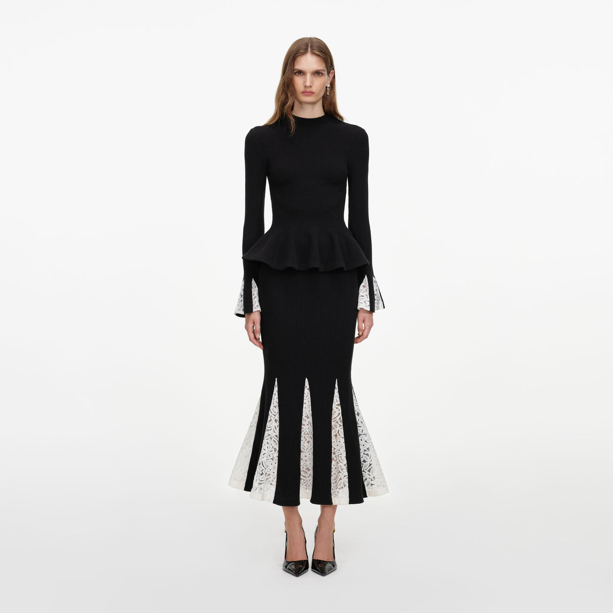 Front view of a woman wearing the Black Lace Insert Knit Midi Dress