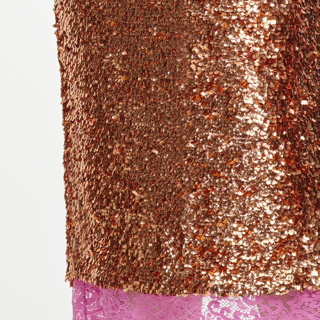 A close up of the fabric for the Gold Sequin Midi Skirt