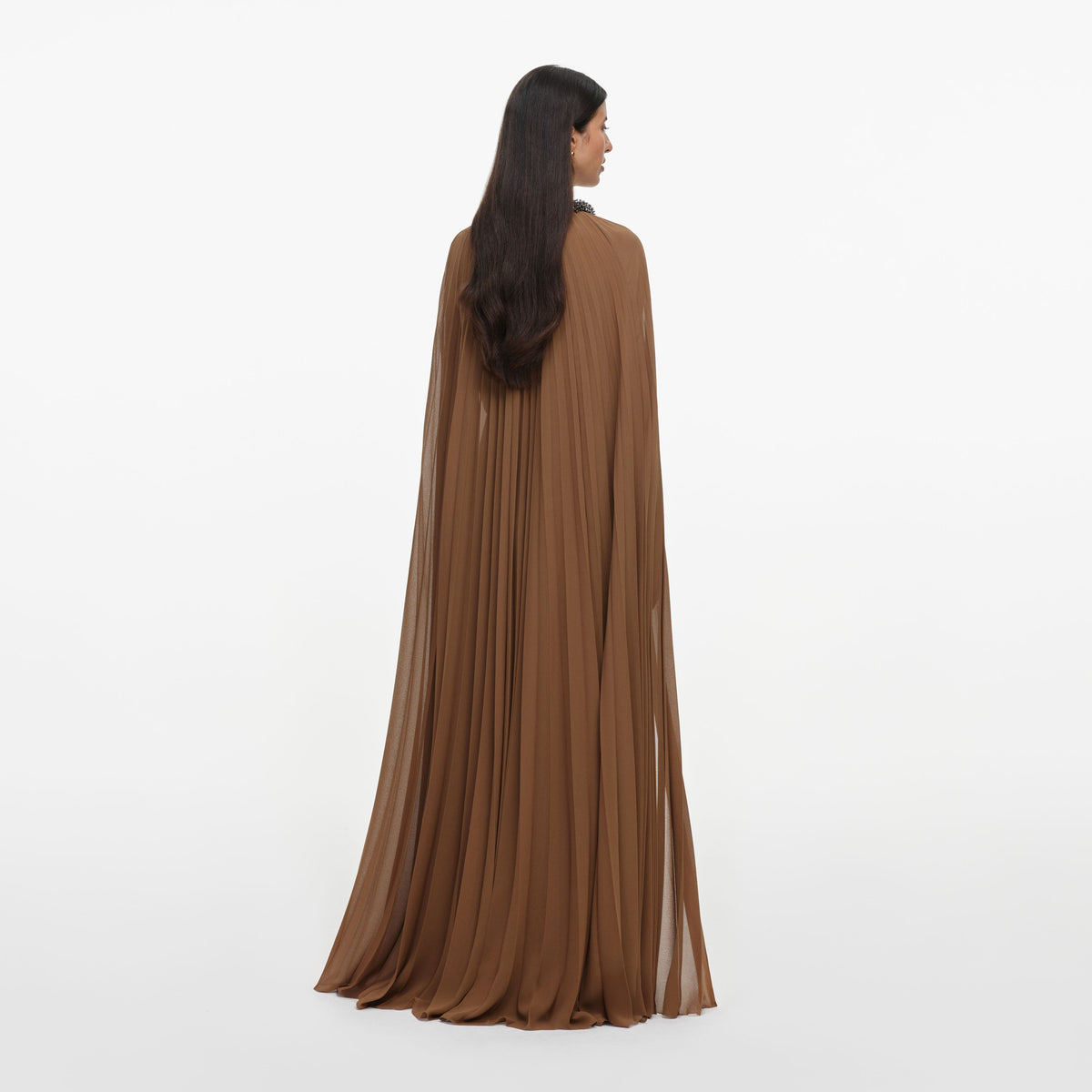 Back view of a woman wearing the Brown Georgette Cape Maxi Dress