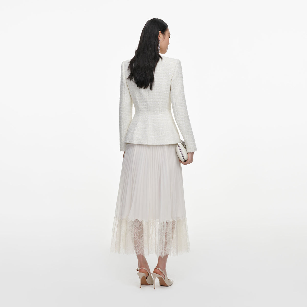 Back view of a woman wearing the Cream Boucle Wrap Midi Dress