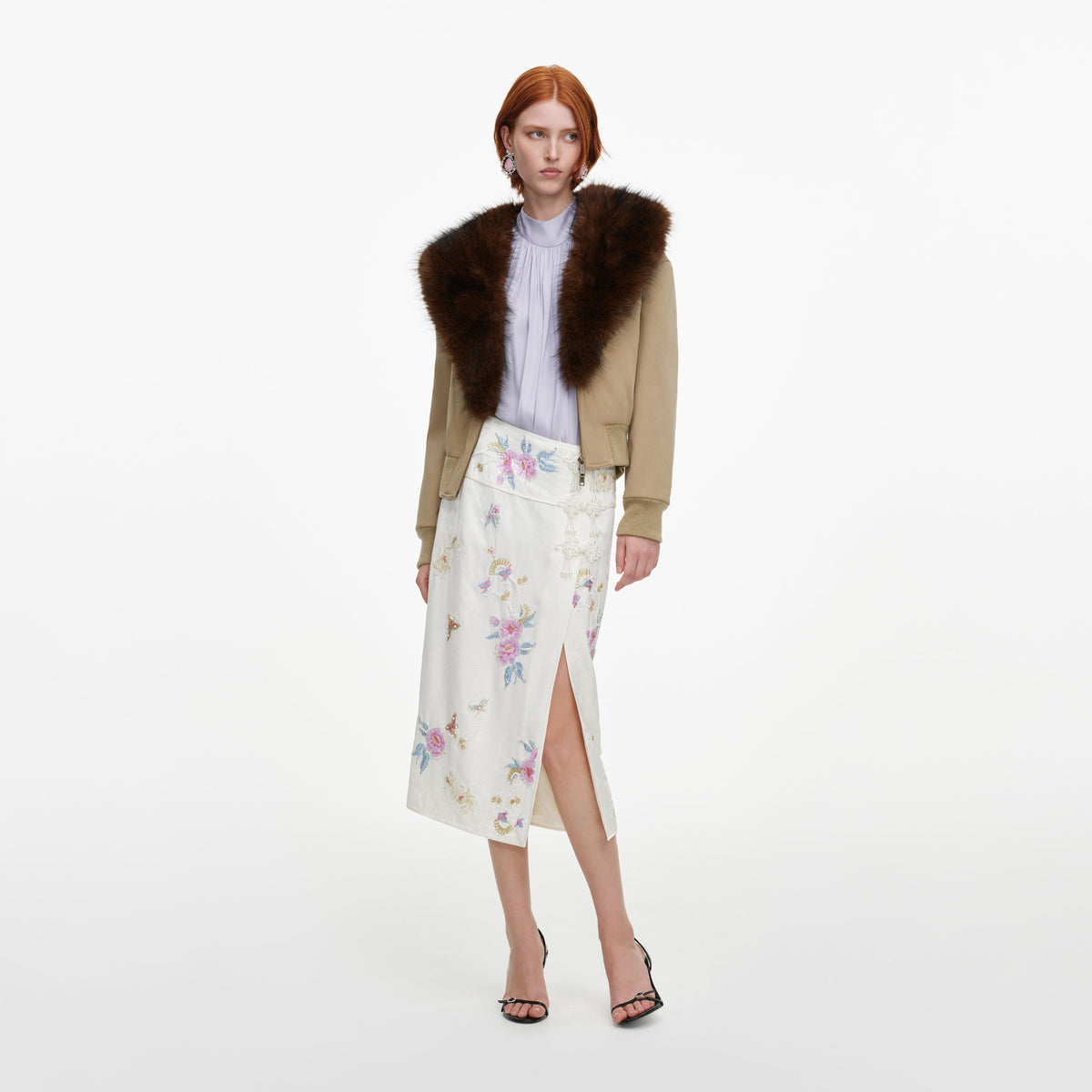 Front view of a woman wearing the Cream Jacquard Floral Midi Skirt