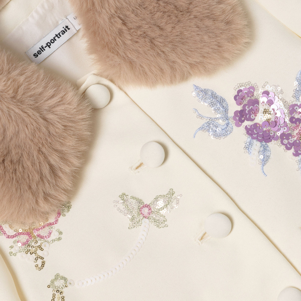 Detail Shot of the Cream Floral Jacquard Fur Collar Jacket