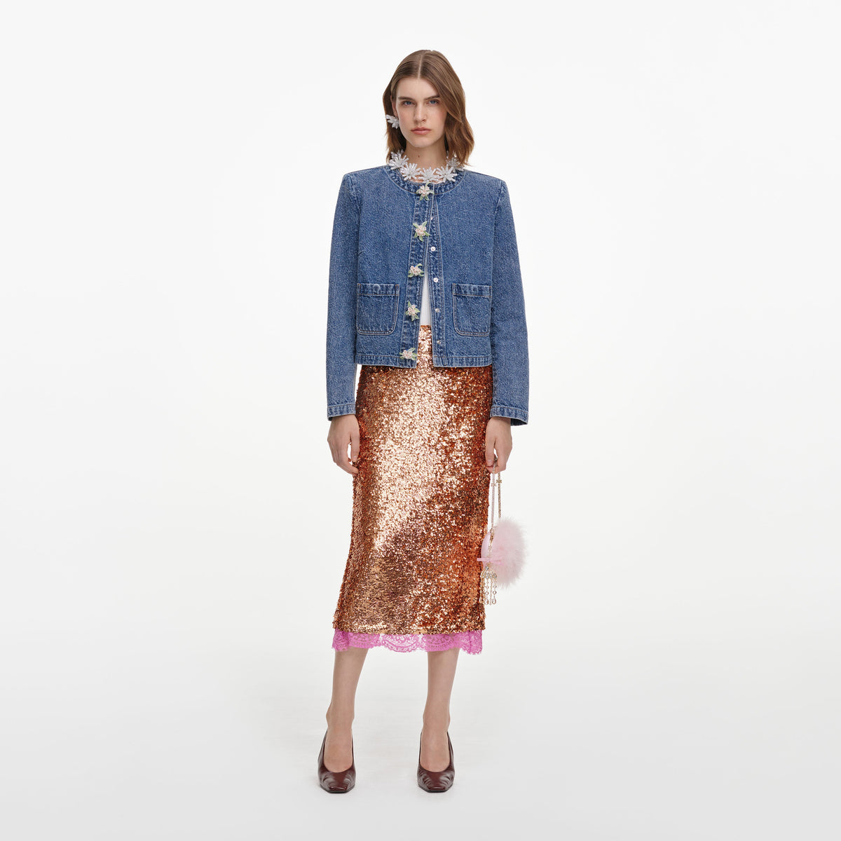 Front view of a woman wearing the Textured Denim Jacket