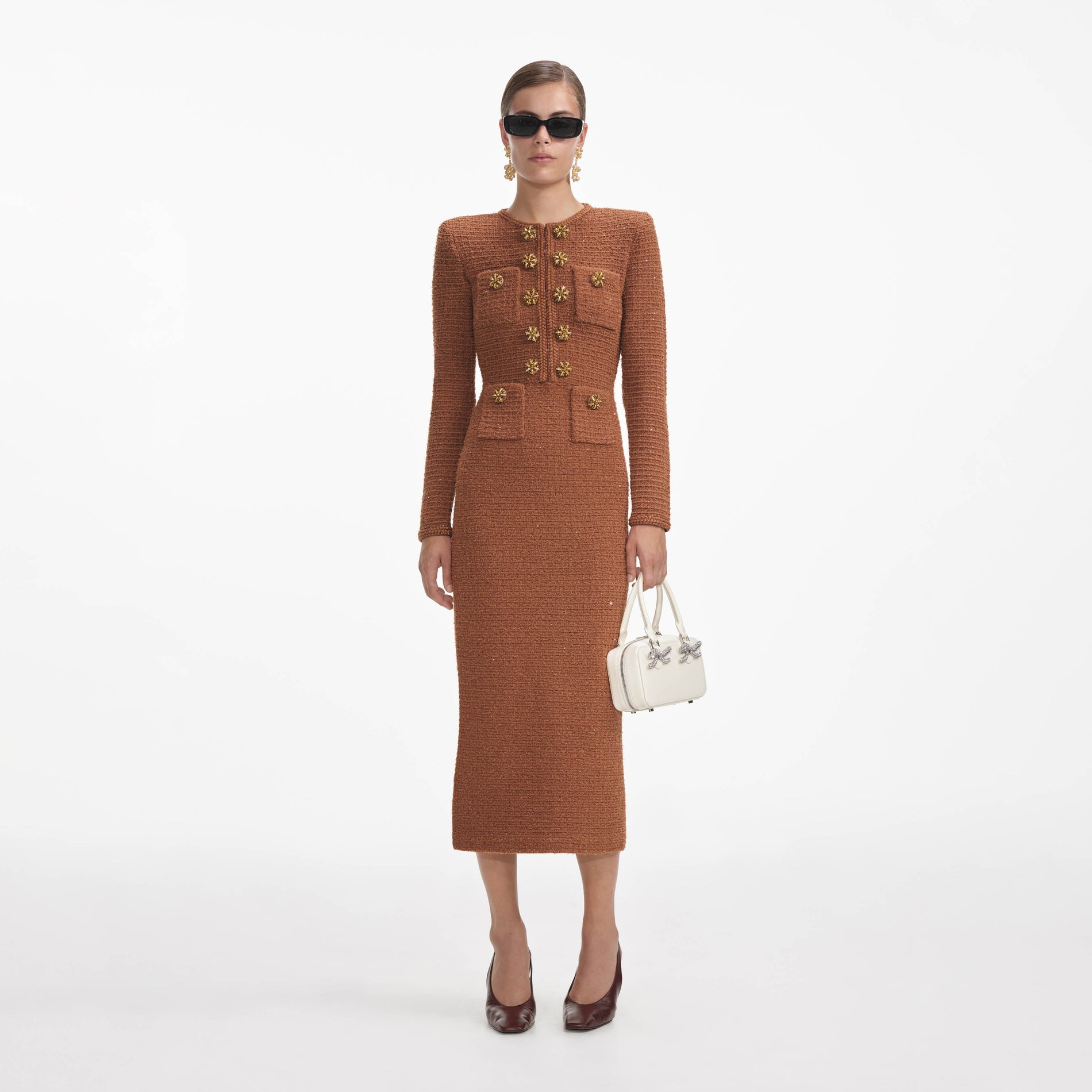 Front view of a woman wearing the Brown Textured Knit Midi Dress