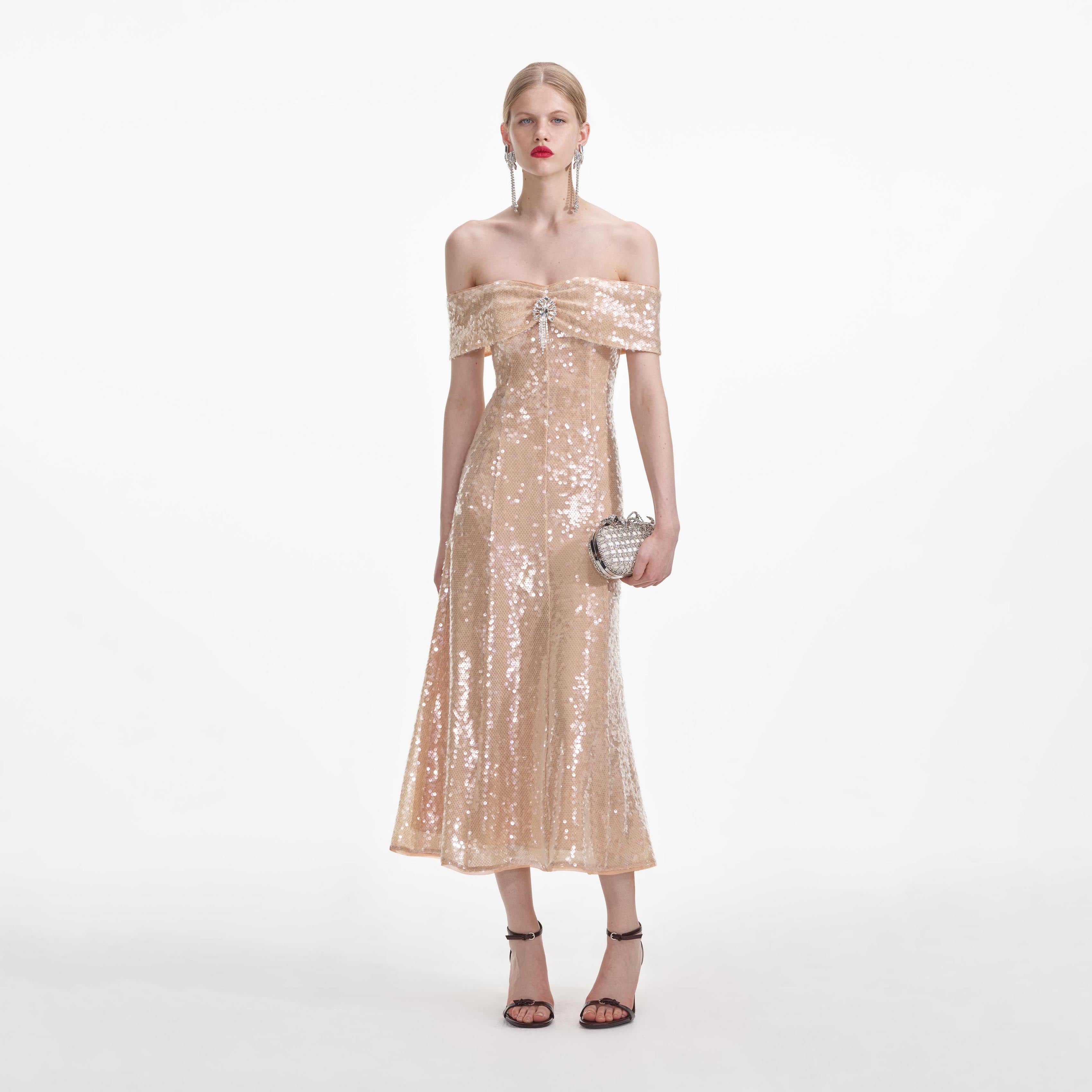 Gold sequin off the shoulder dress hotsell