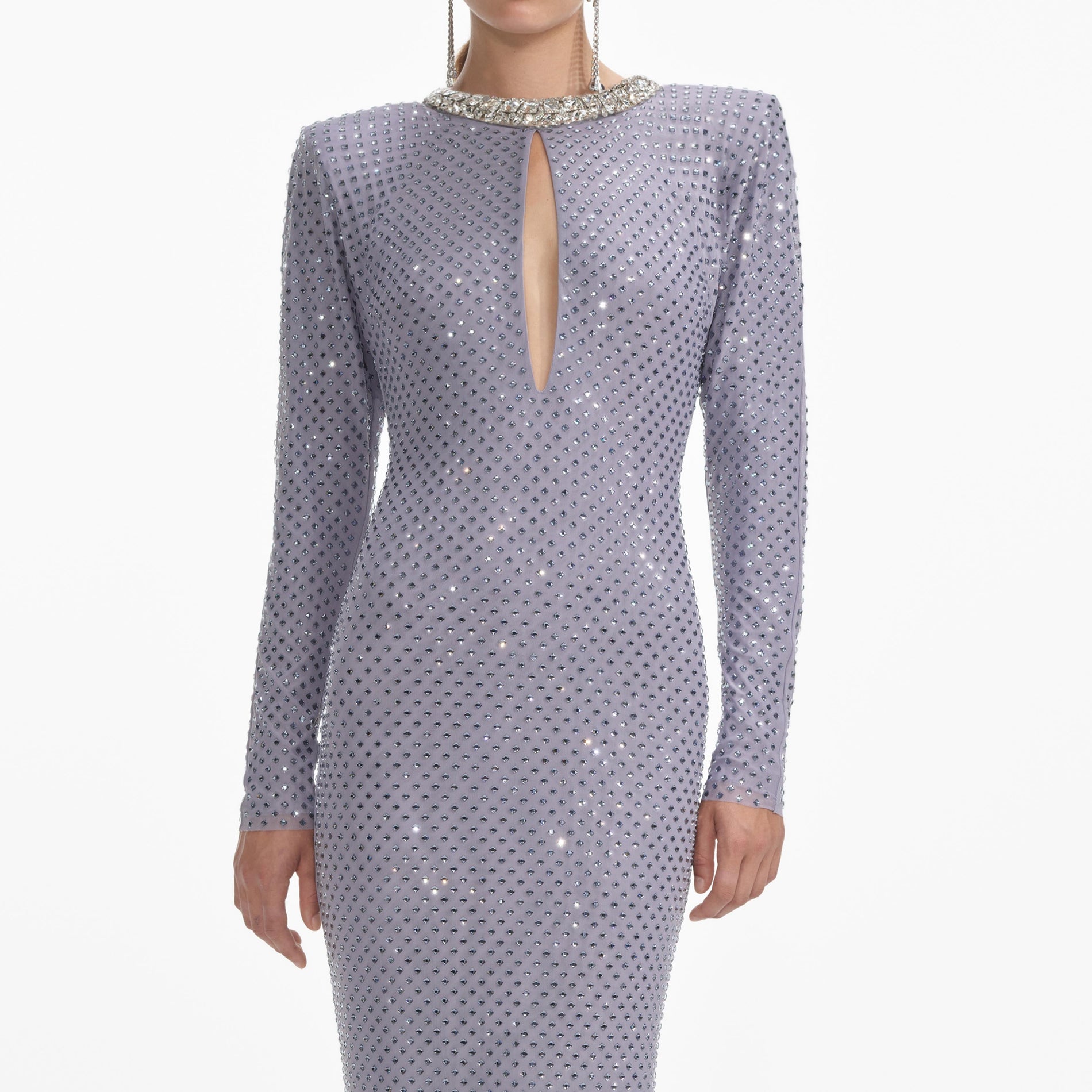 A close up of a woman wearing the Grey Rhinestone Fishnet Maxi Dress