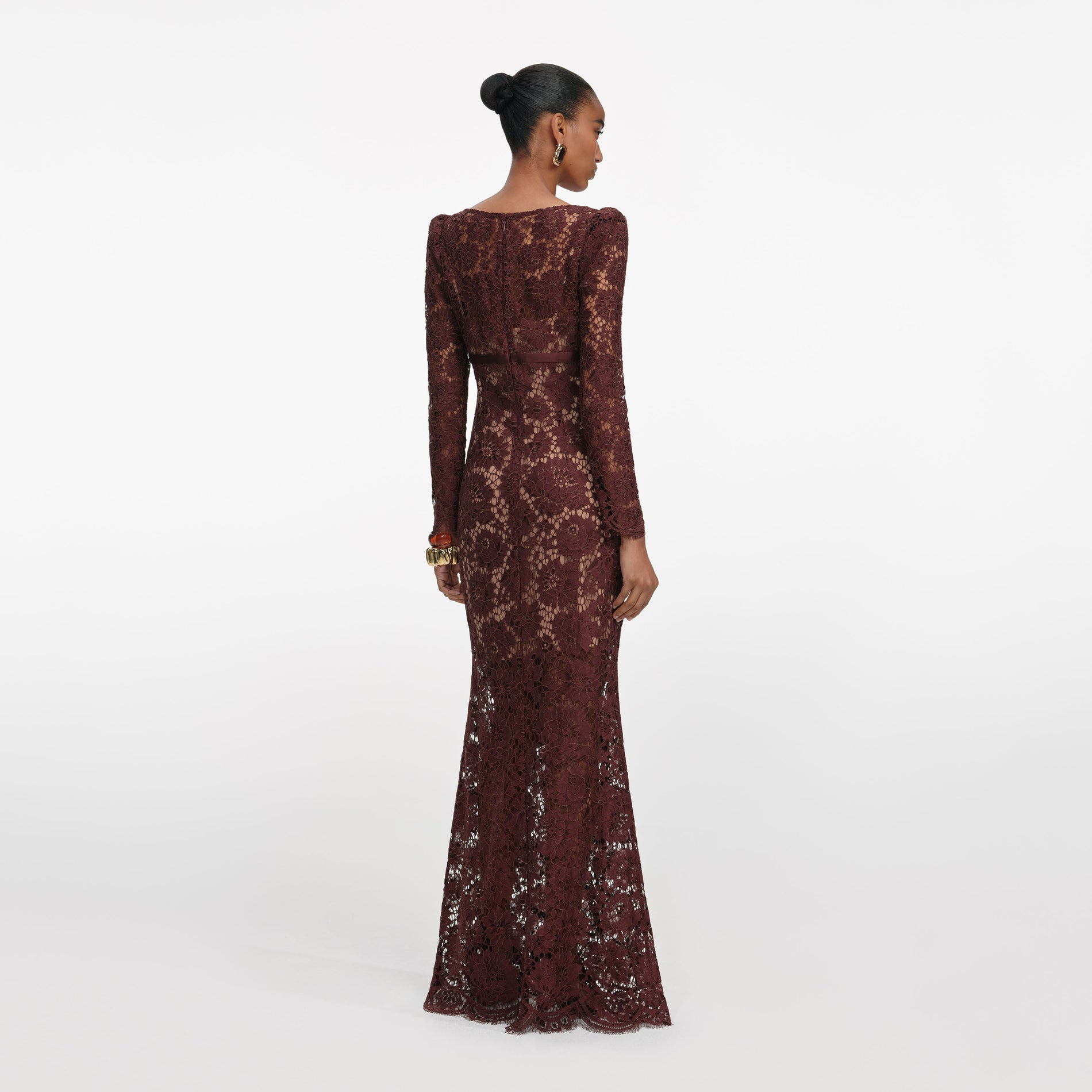 Back view of a woman wearing the Brown Floral Lace Maxi Dress