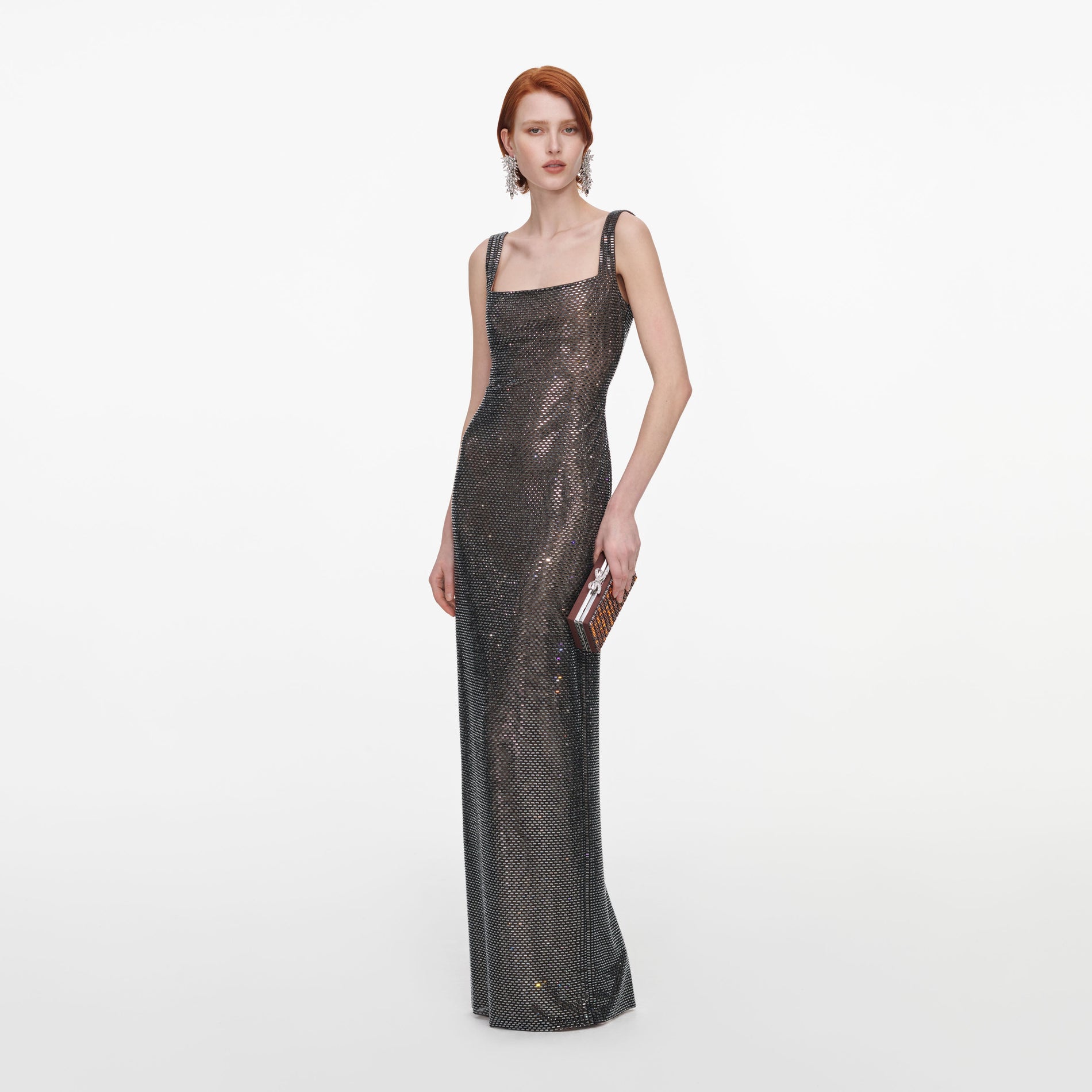 Side view of a woman wearing the Gunmetal Square Neck Rhinestone Maxi Dress
