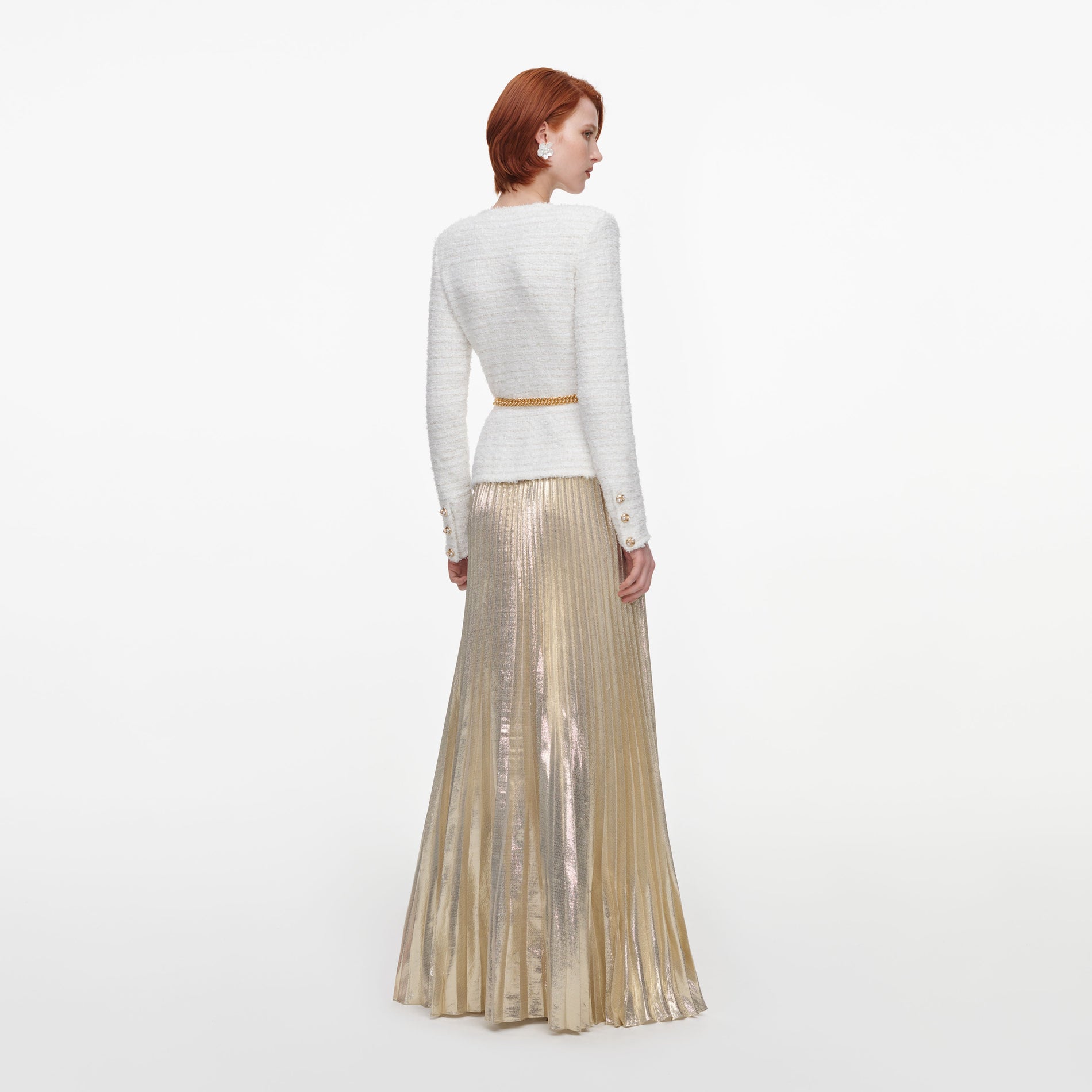 Back view of a woman wearing the Cream Textured Knit Metallic Chiffon Maxi Dress