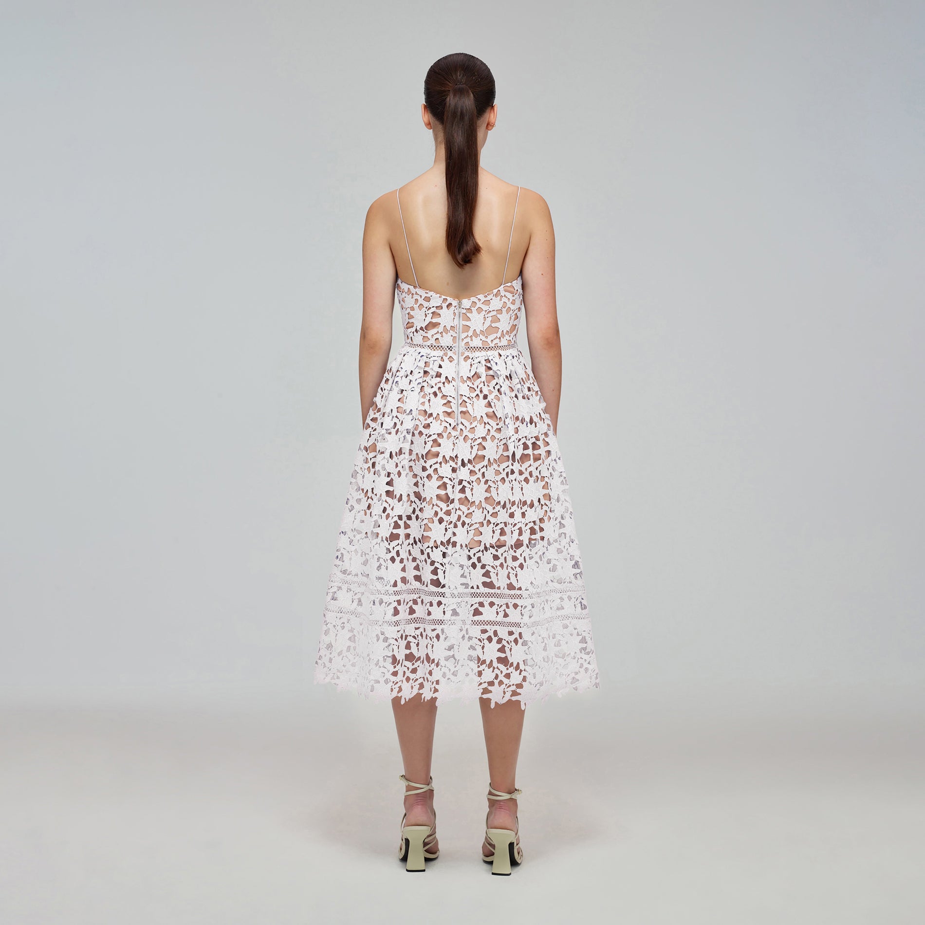 A woman wearing the Azaelea Dress White