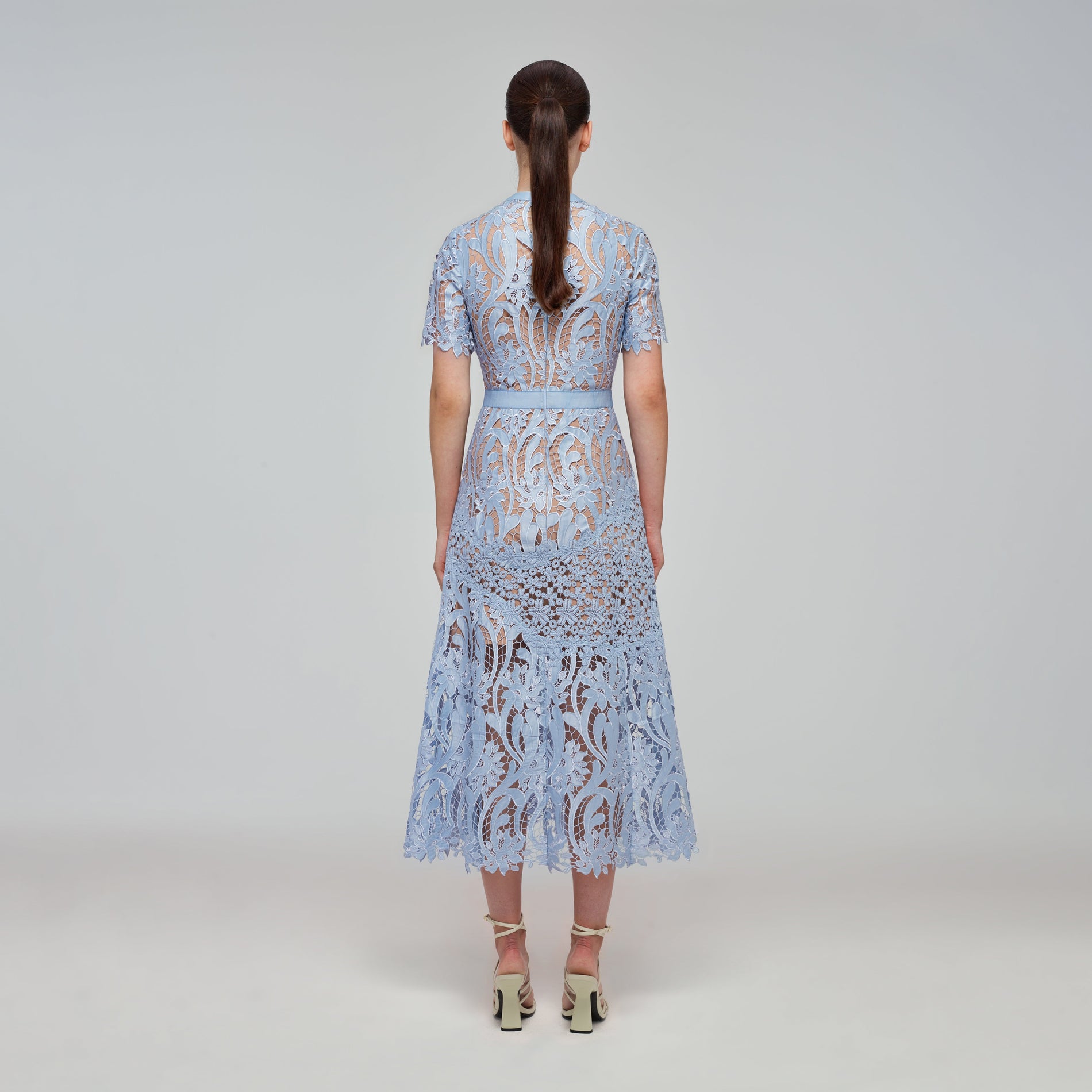 A woman wearing the Blue Prairie Midi Dress