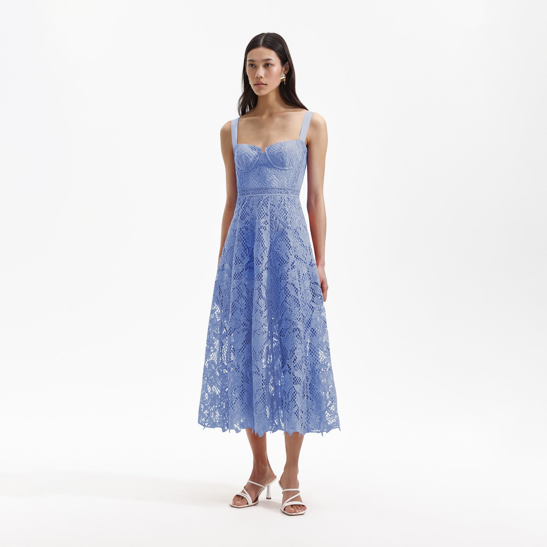 Side view of a woman wearing the Blue Lace Midi Sweetheart Dress