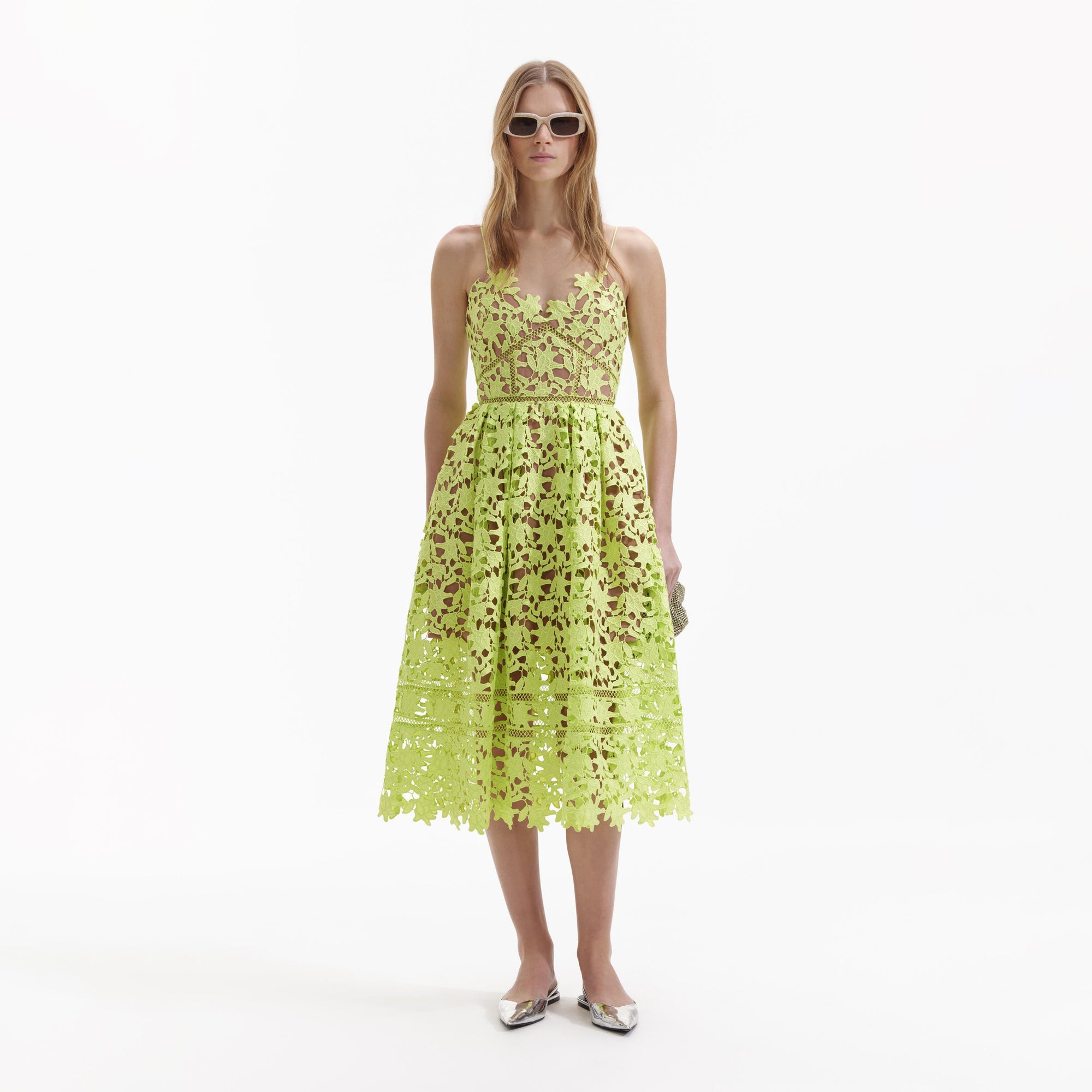 Front view of a woman wearing the Lime Azaelea Lace Midi Dress