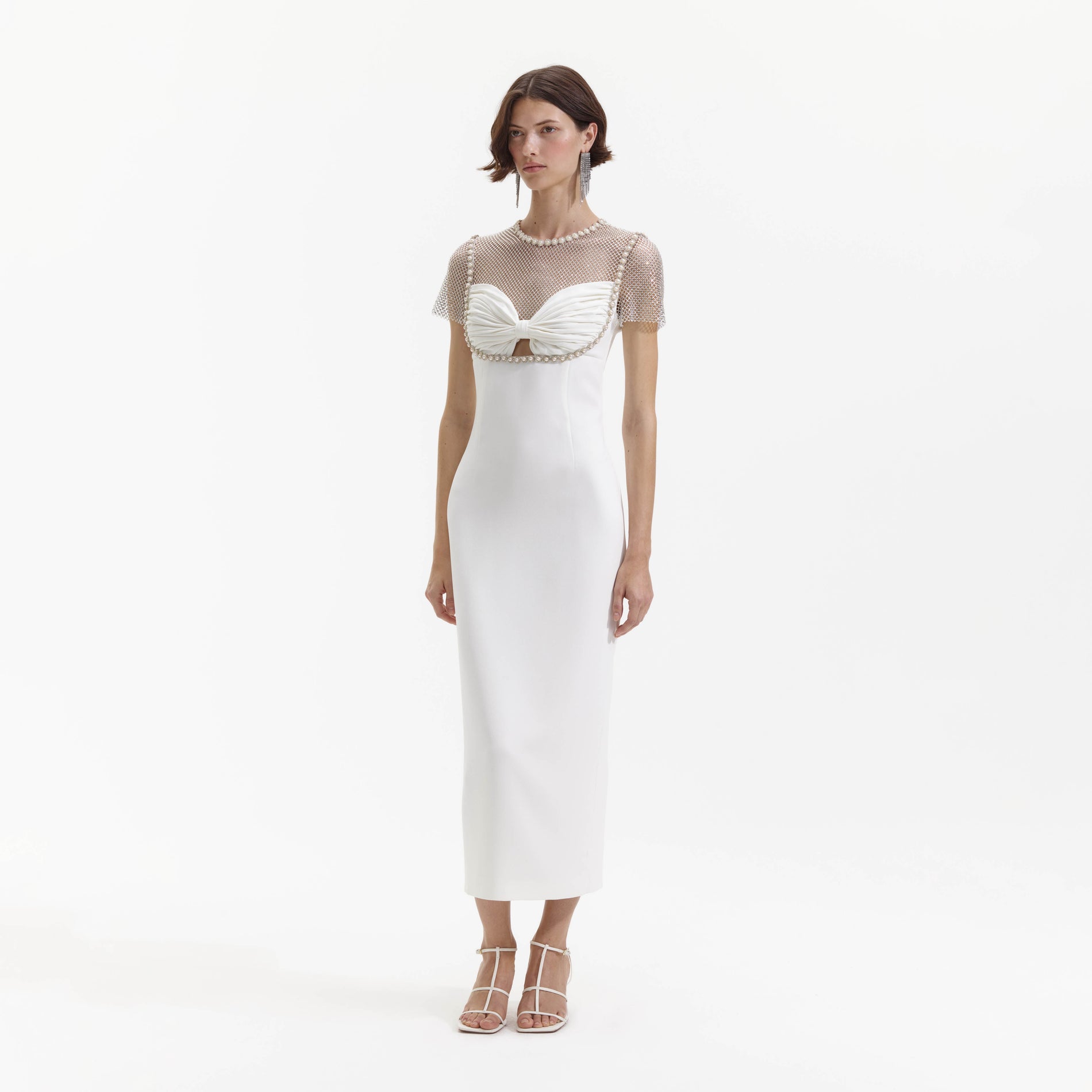 Side view of a woman wearing the White Diamante Crepe Midi Dress