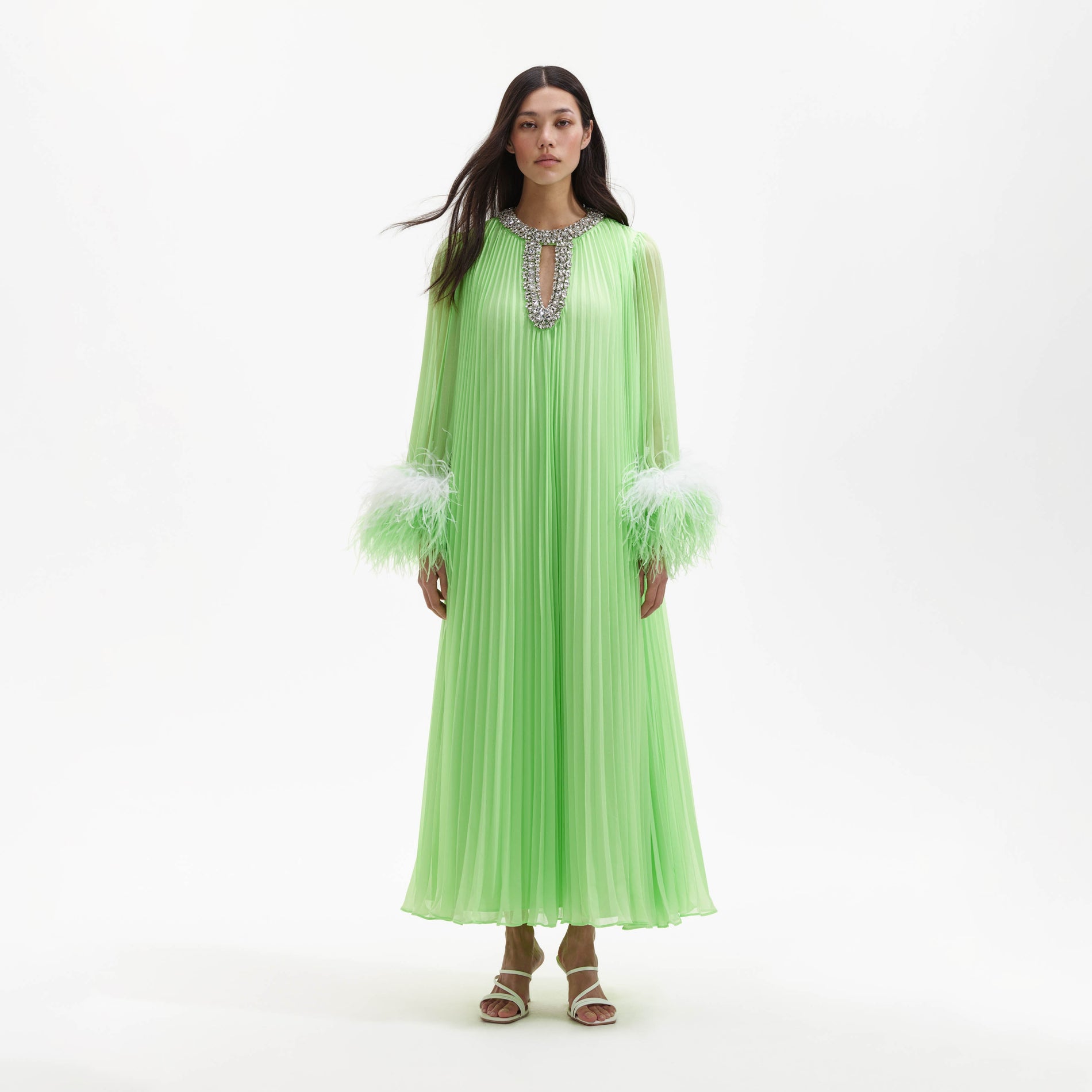 Front view of a woman wearing the Green Chiffon Feather Midi Dress