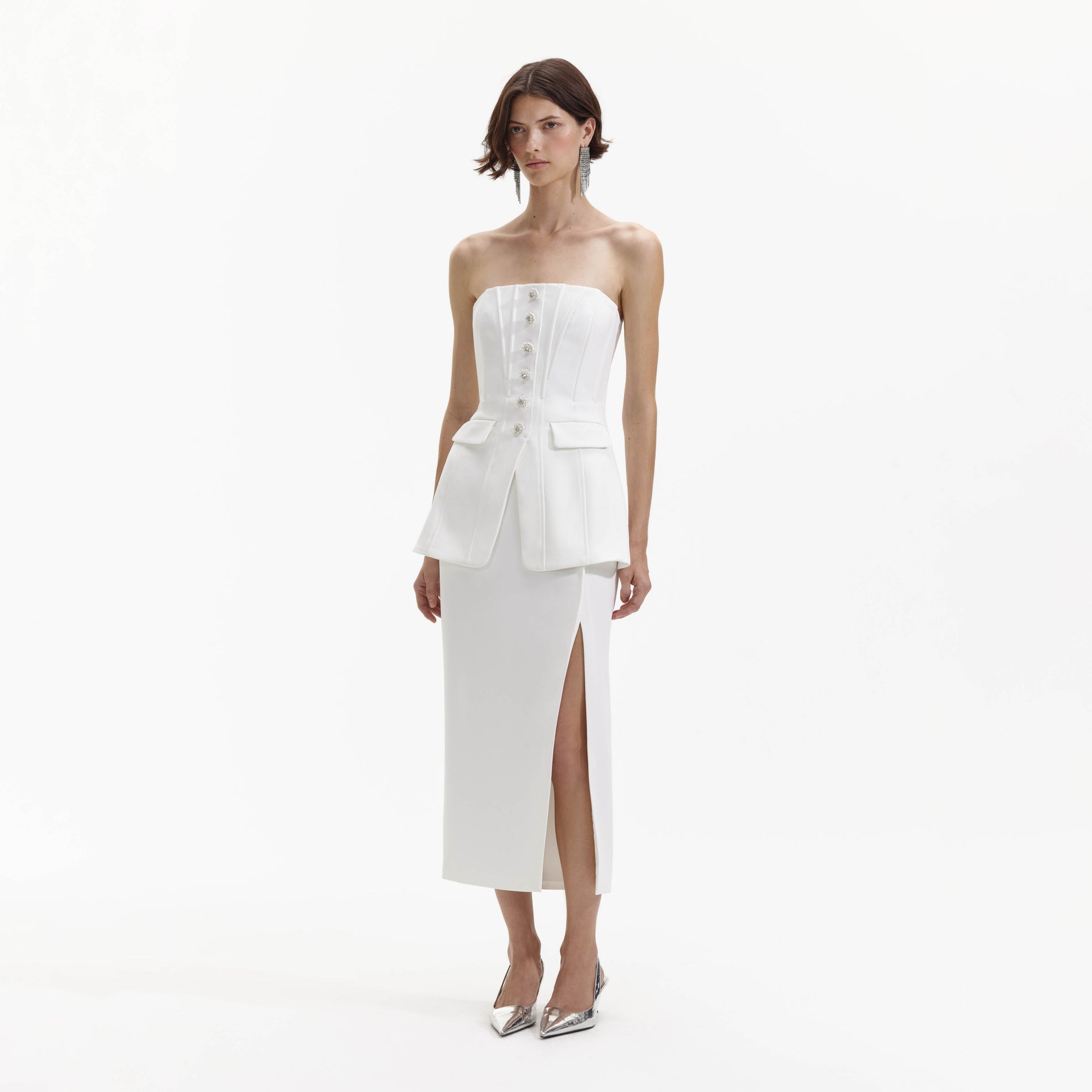 Side view of a woman wearing the White Bandeau Crepe Tailored Midi Dress