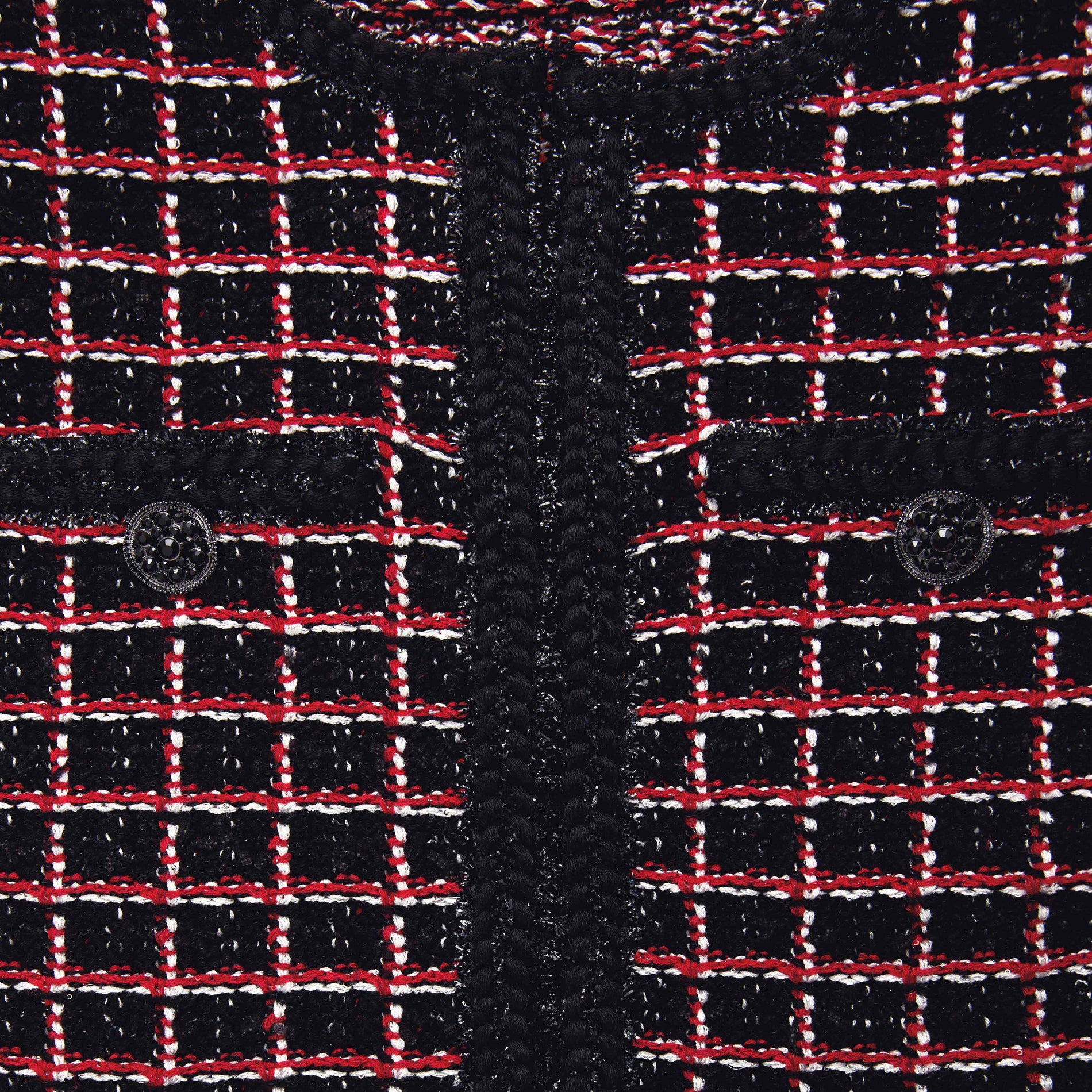Side view of a woman wearing the Black And Red Check Cardigan