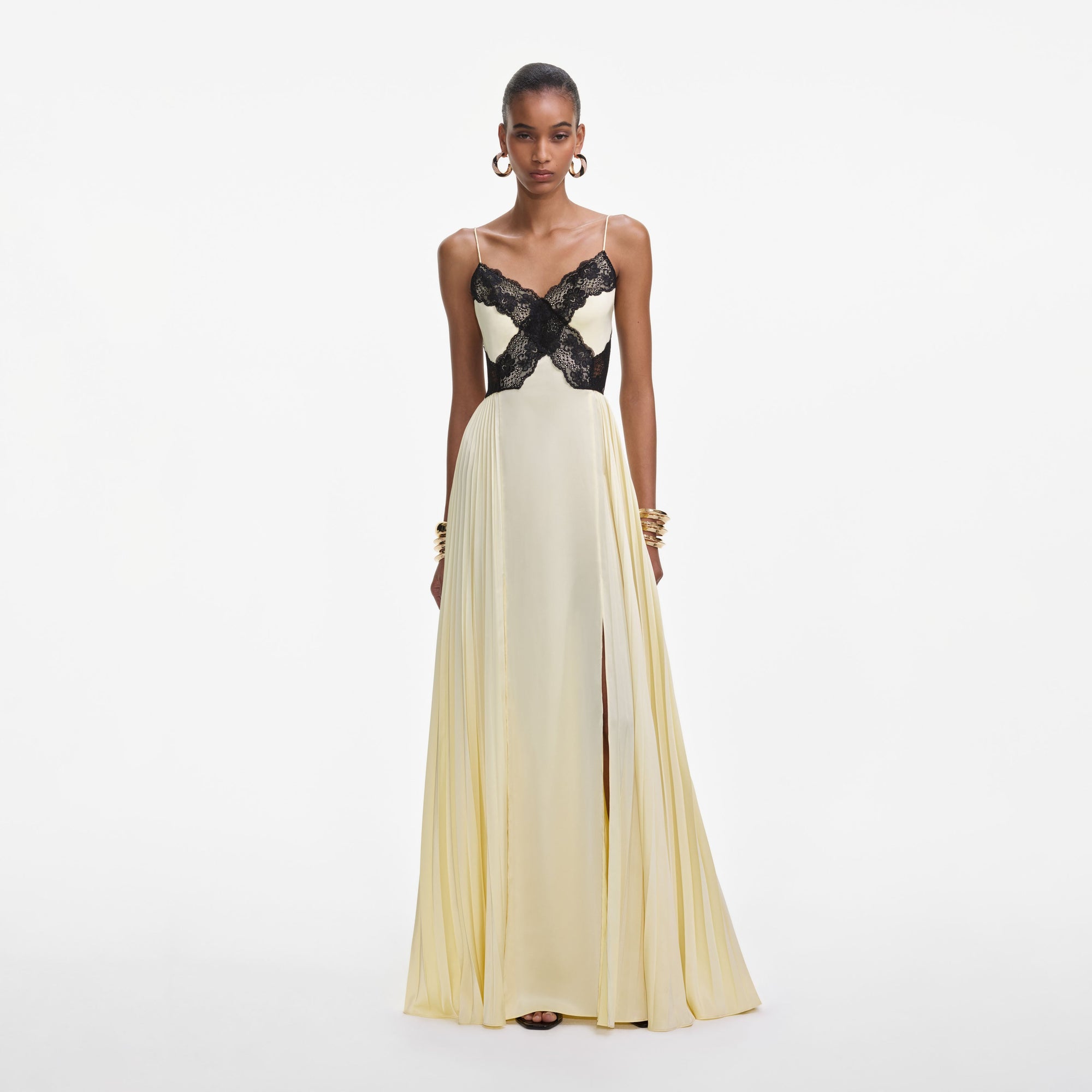 Front view of a woman wearing the Yellow Satin Lace Maxi Dress