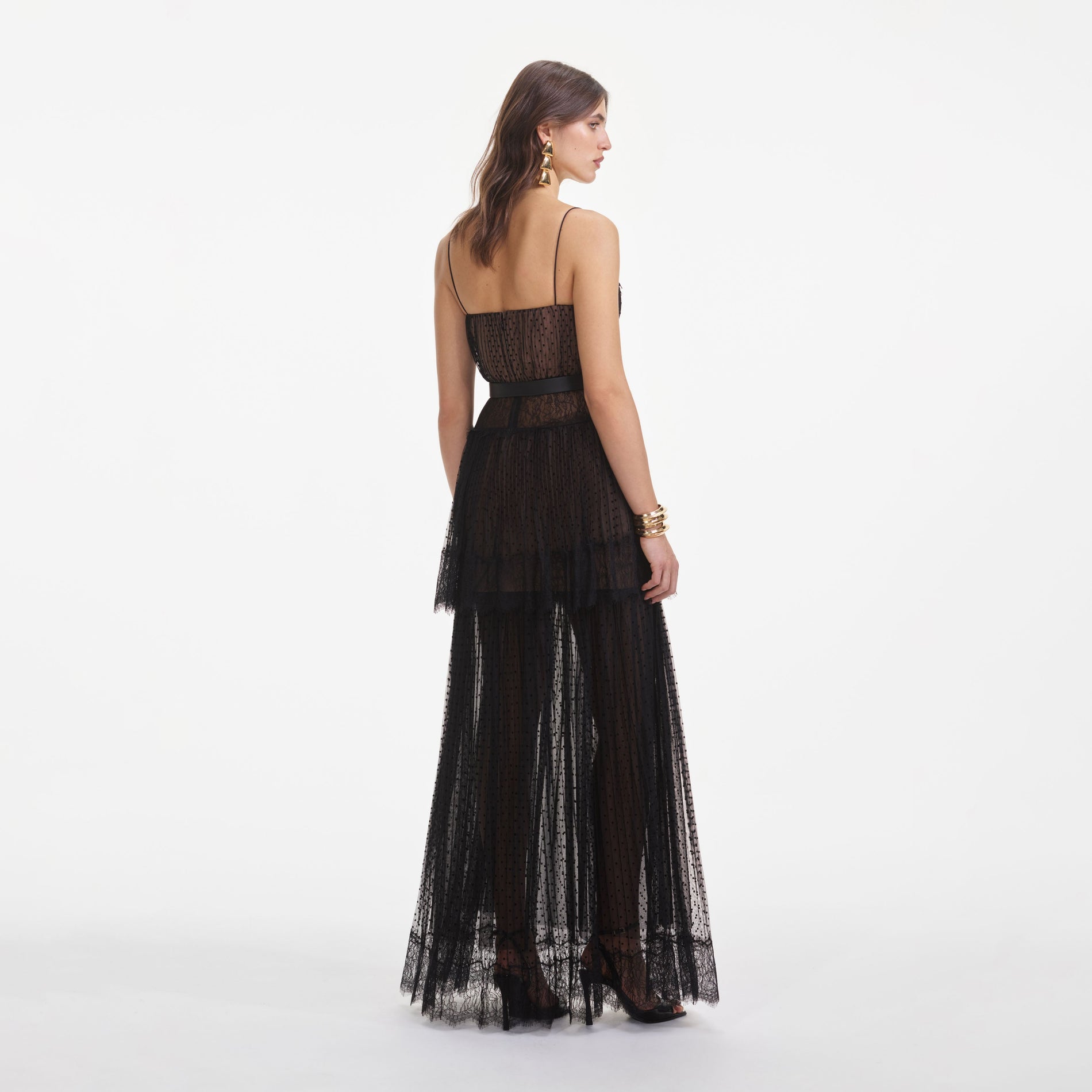 Back view of a woman wearing the Black Dot Mesh Tiered Maxi Dress