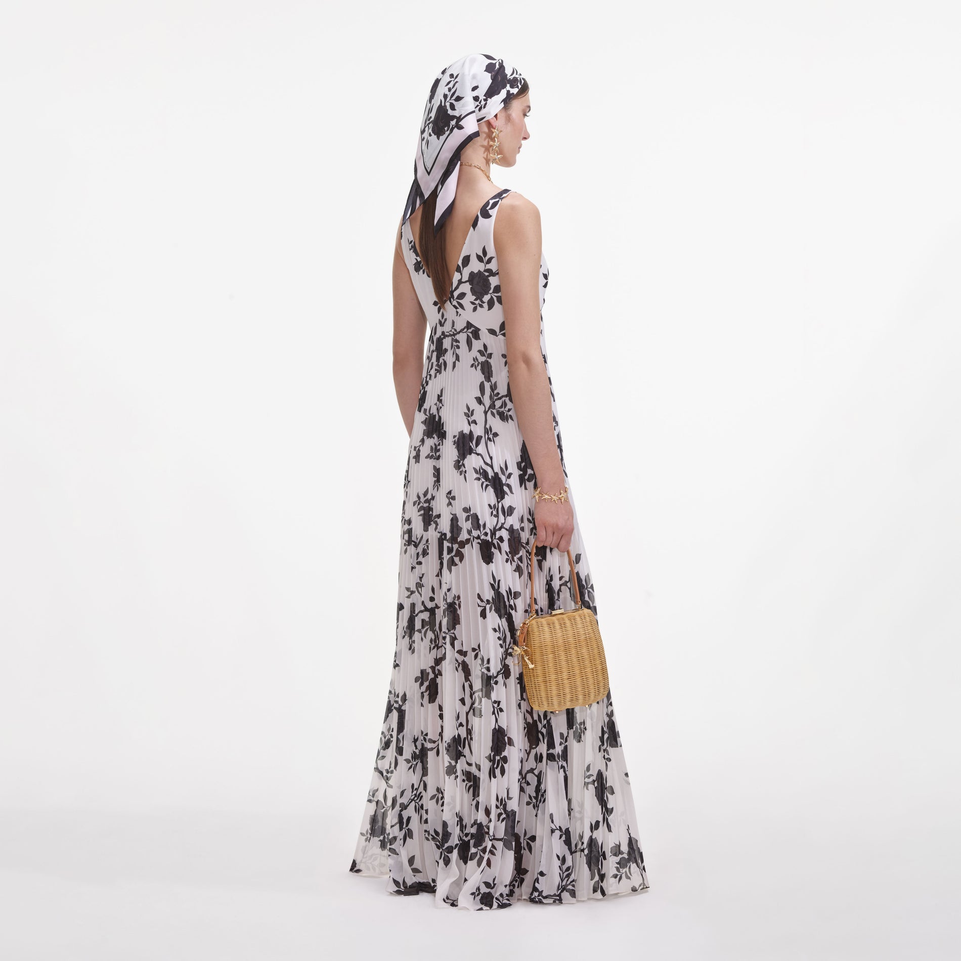 Back view of a woman wearing the Floral Print Chiffon Maxi Dress