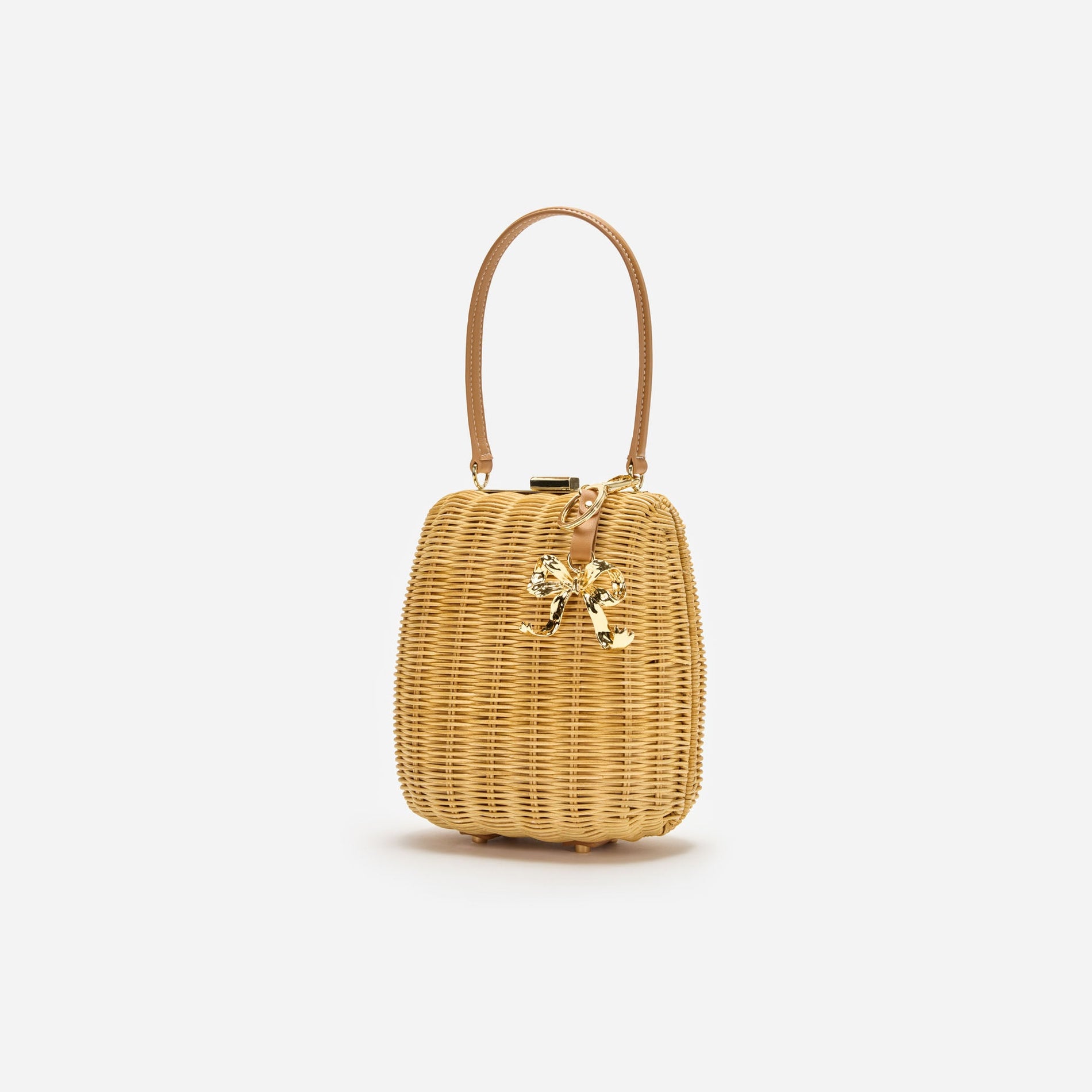 A photo of the Brown Rattan Bag With Keychain