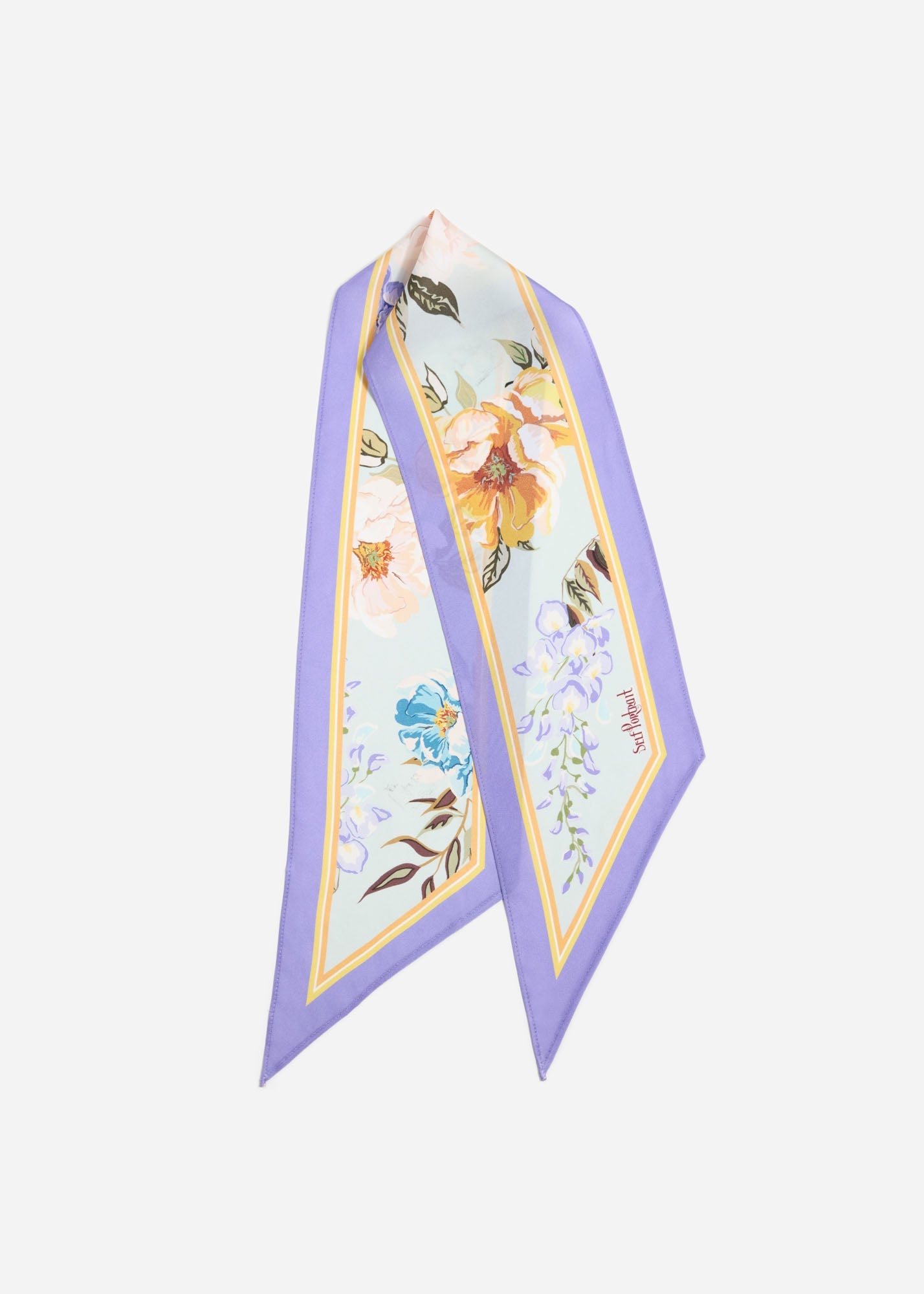 Side view of a woman wearing the Blue Floral Twill Scarf