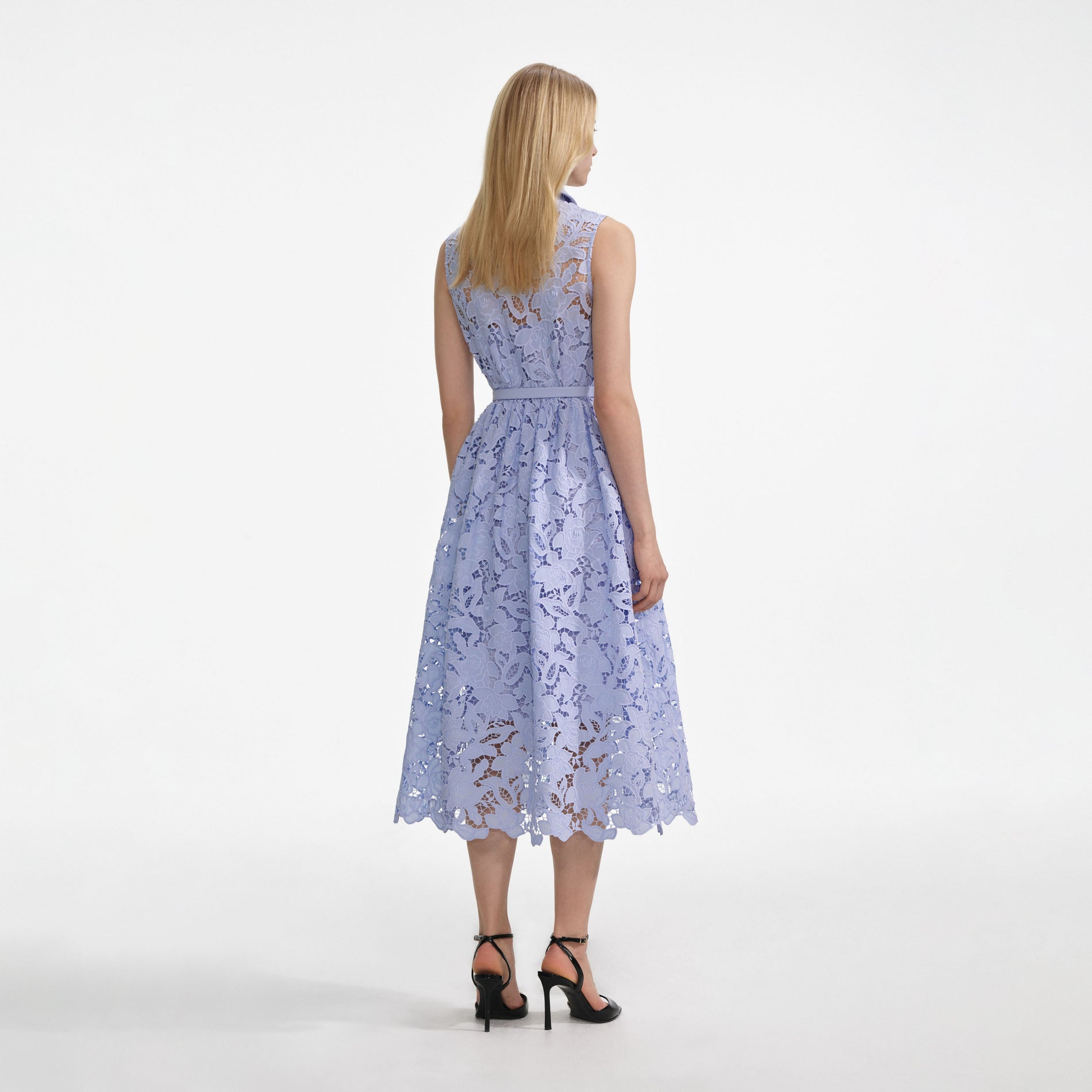 Back view of a woman wearing the Blue Lace Sleeveless Midi Dress