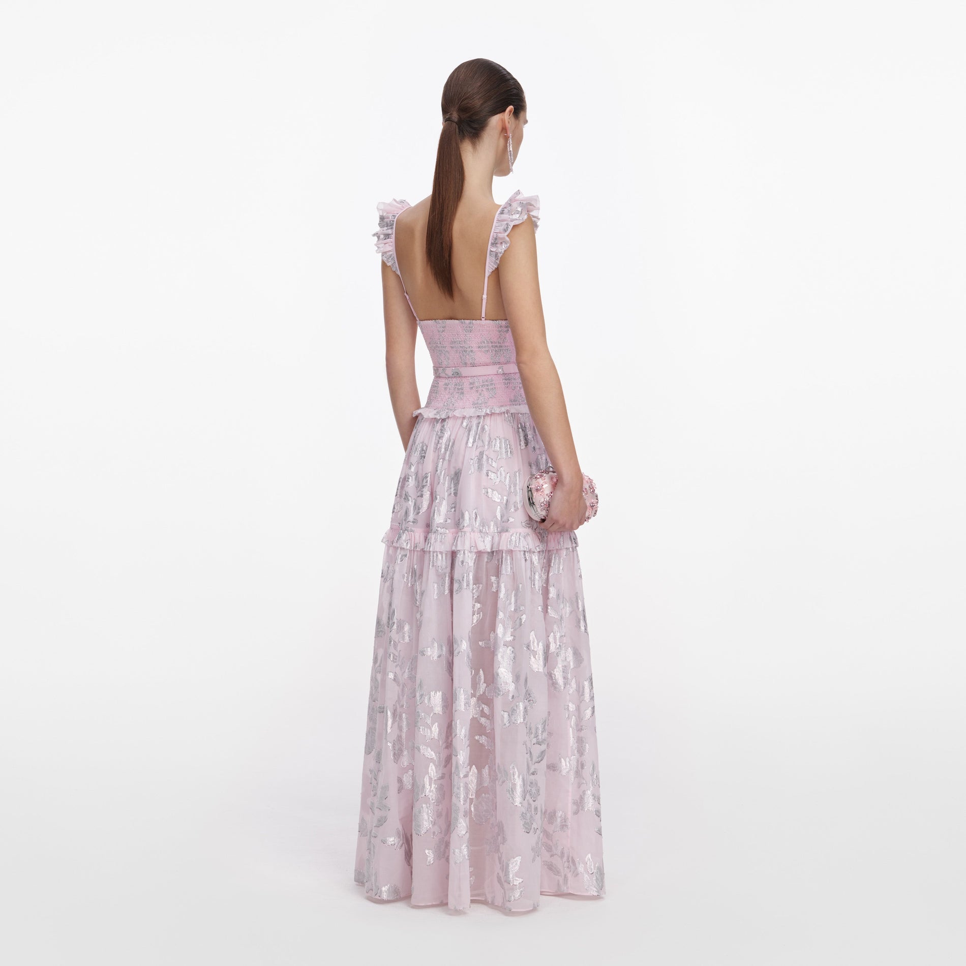 Back view of a woman wearing the Pink Metallic Chiffon Flower Maxi Dress