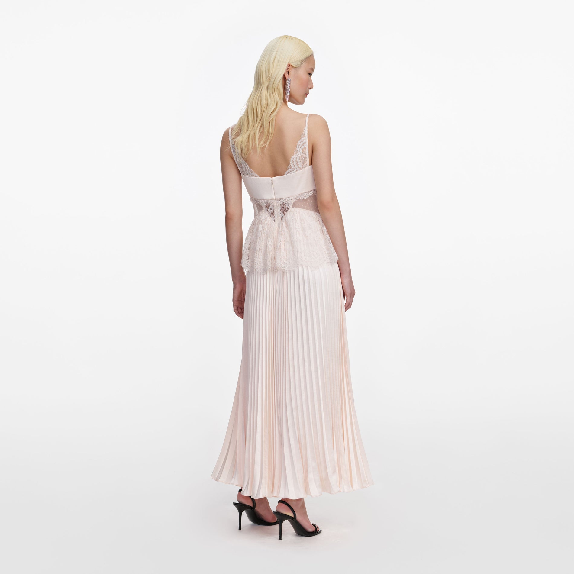 Back view of a woman wearing the Blush Satin Lace Midi Dress
