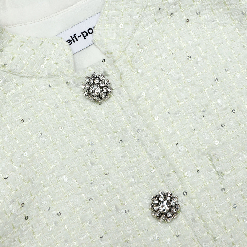 A close up of the fabric for the Lime Boucle Top
