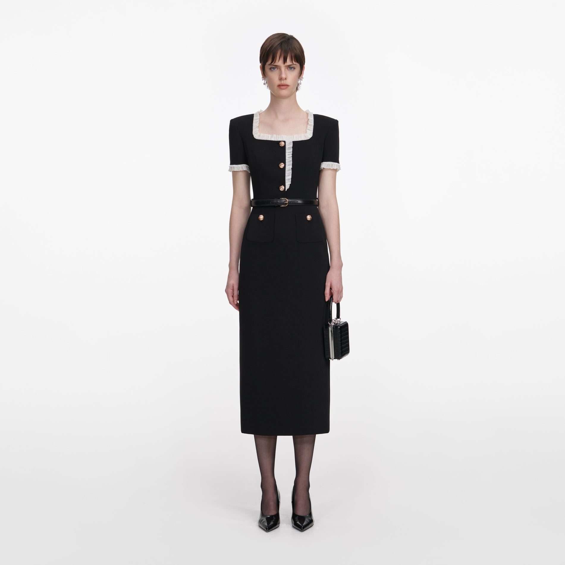Front view of a woman wearing the Black Crepe Contrast Frill Midi Dress