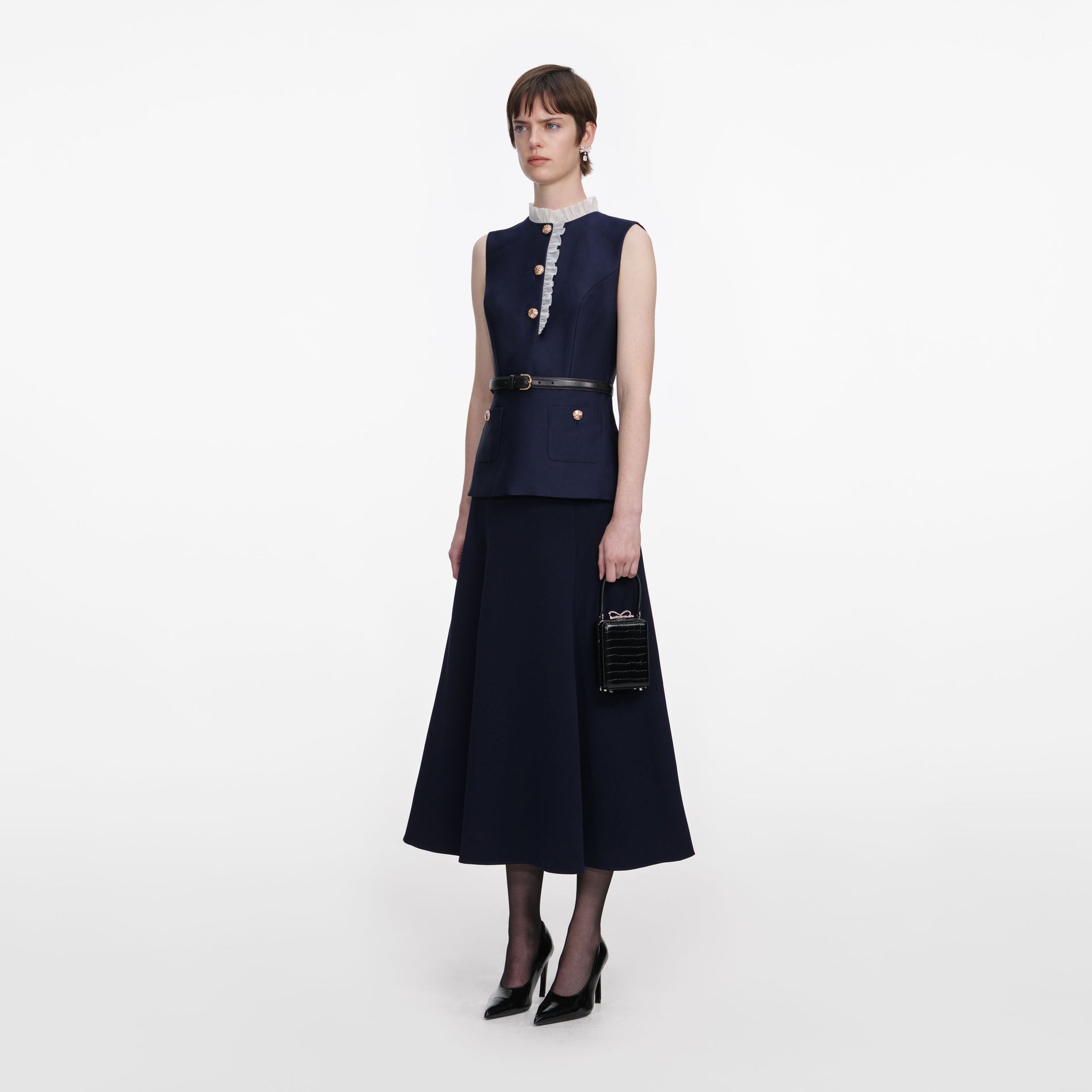 Side view of a woman wearing the Navy Taffeta Contrast Frill Midi Dress