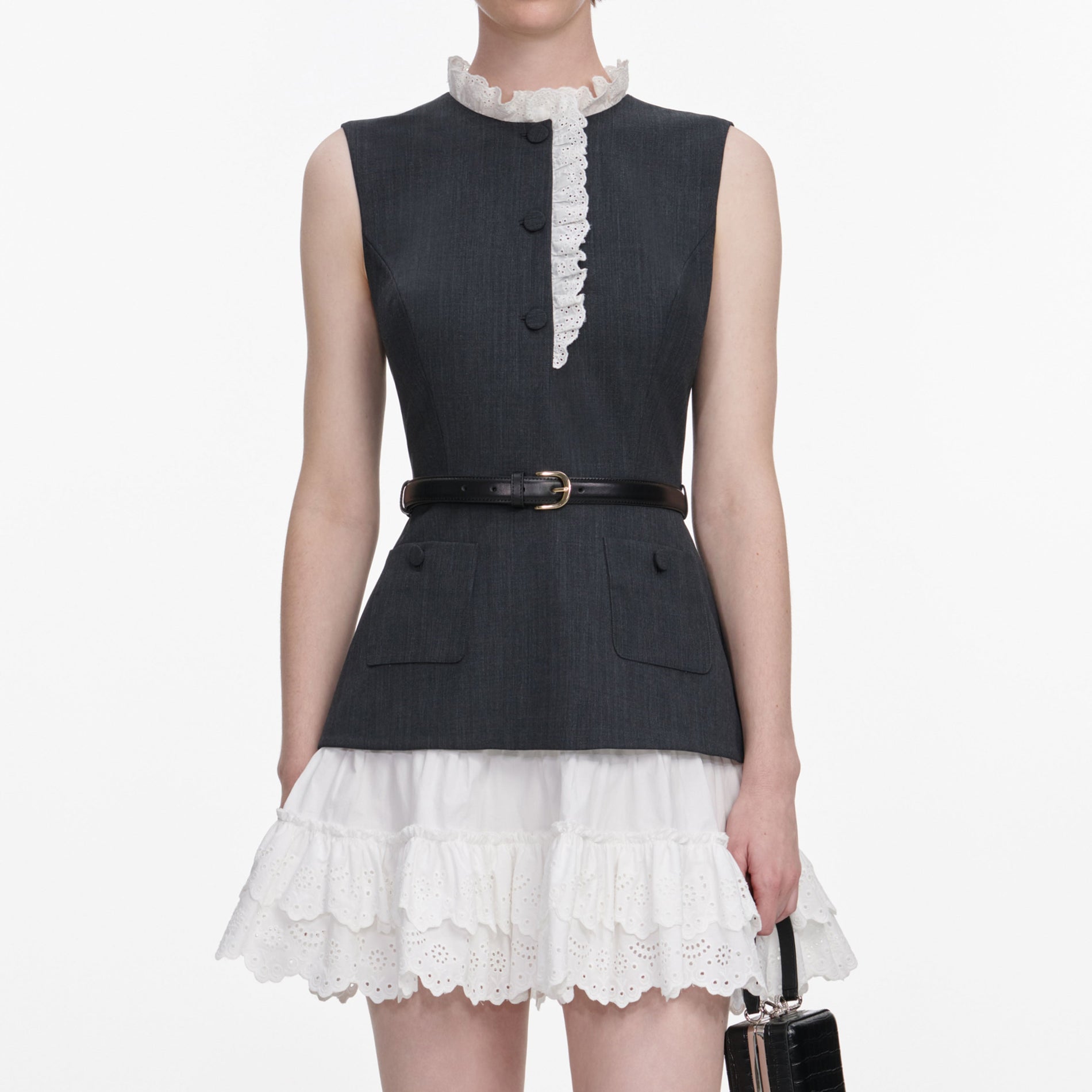 A close up of a woman wearing the Grey Tailored Cotton Frill Mini Dress