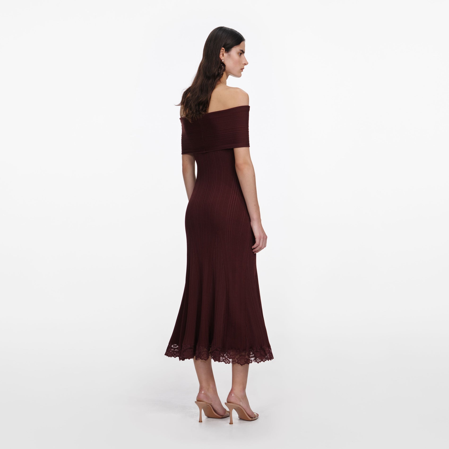 Back view of a woman wearing the Burgundy Knit Lace Insert Midi Dress