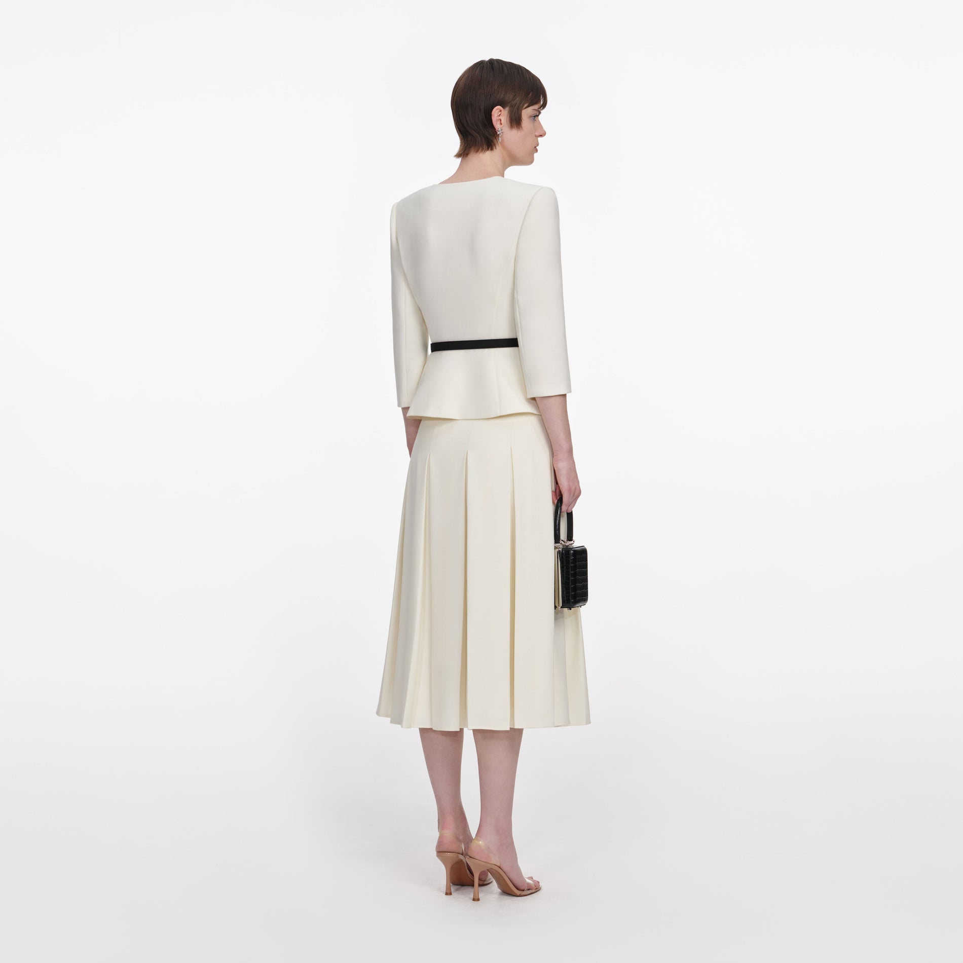 Back view of a woman wearing the Cream 3D Flower Tailored Midi Dress
