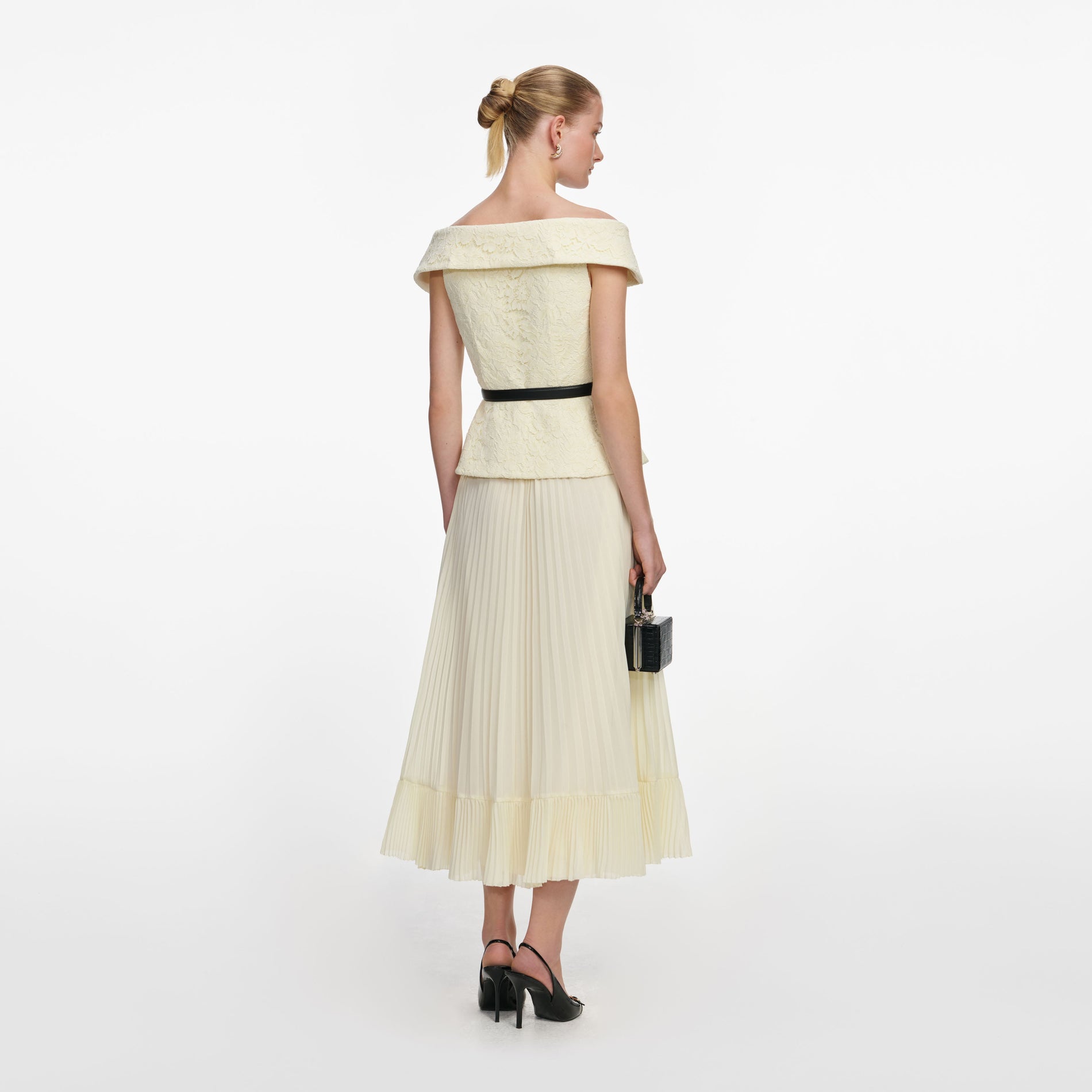 Back view of a woman wearing the Yellow Lace Chiffon Midi Dress