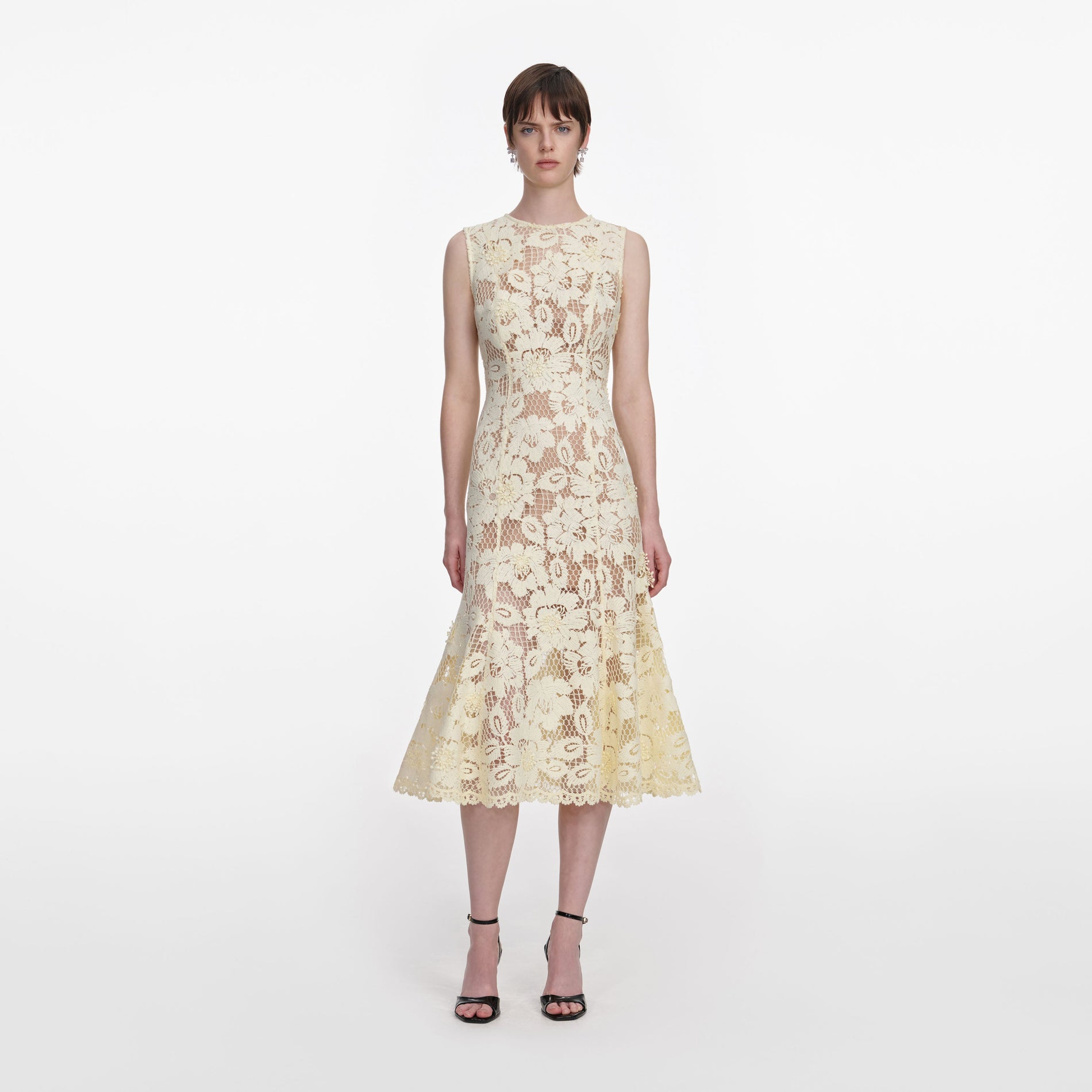 Front view of a woman wearing the Yellow Crochet Lace Midi Dress