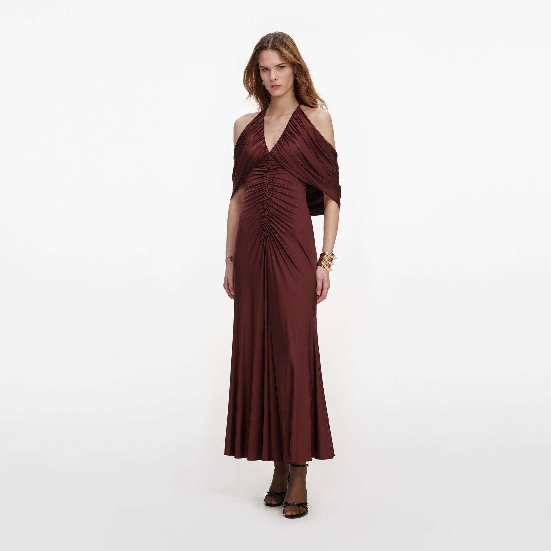 Side view of a woman wearing the Brown Jersey Drape Midi Dress