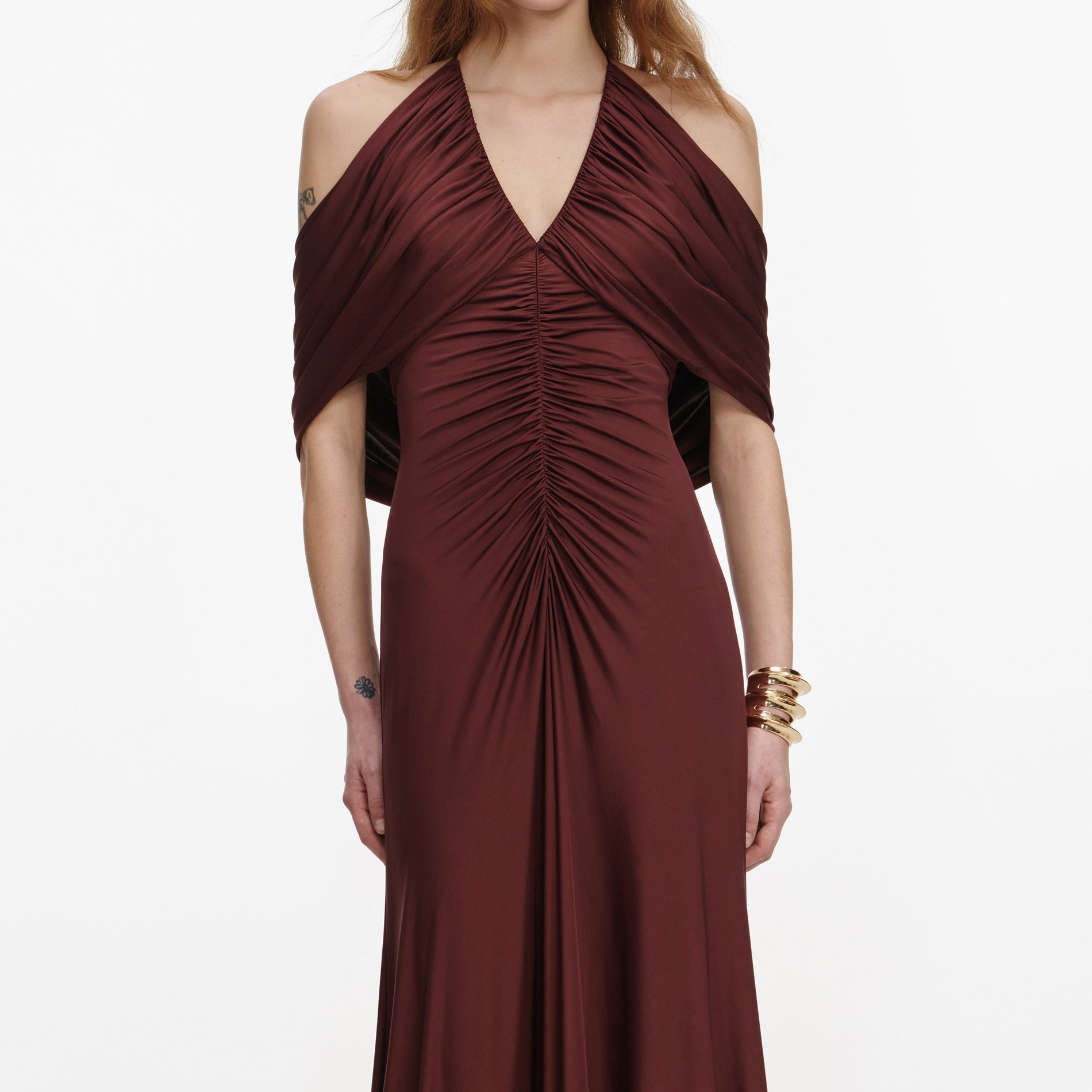 A close up of a woman wearing the Brown Jersey Drape Midi Dress