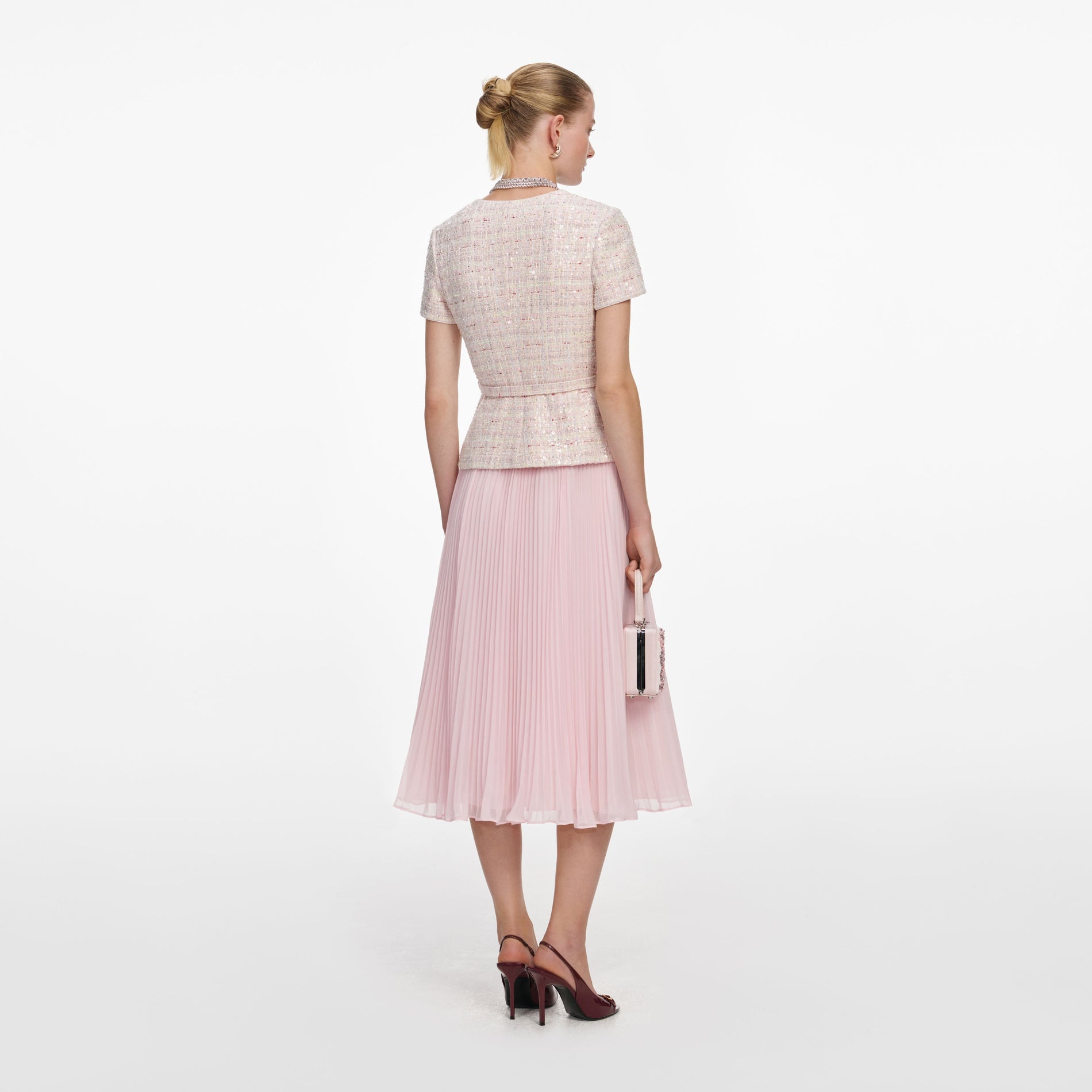 Back view of a woman wearing the Pink Sequin Boucle Tailored Midi Dress