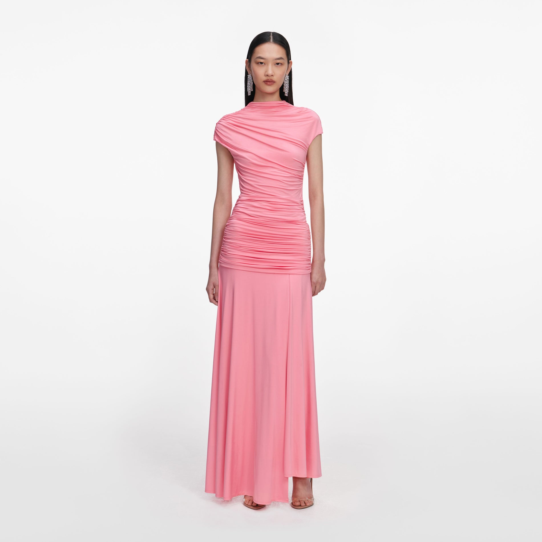 Front view of a woman wearing the Pink Jersey Gathered Maxi Skirt