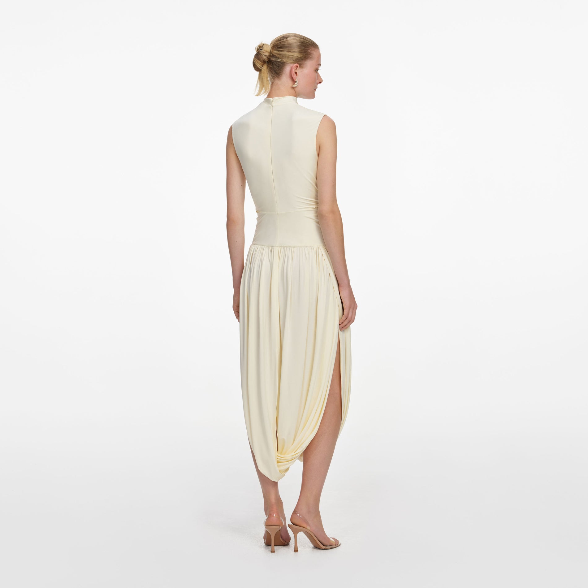 Back view of a woman wearing the Yellow Jersey Wrap Midi Dress