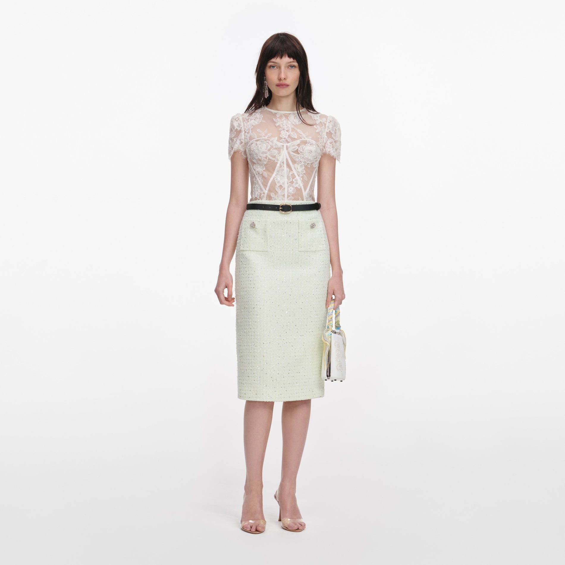 Front view of a woman wearing the White Sequin Lace Top