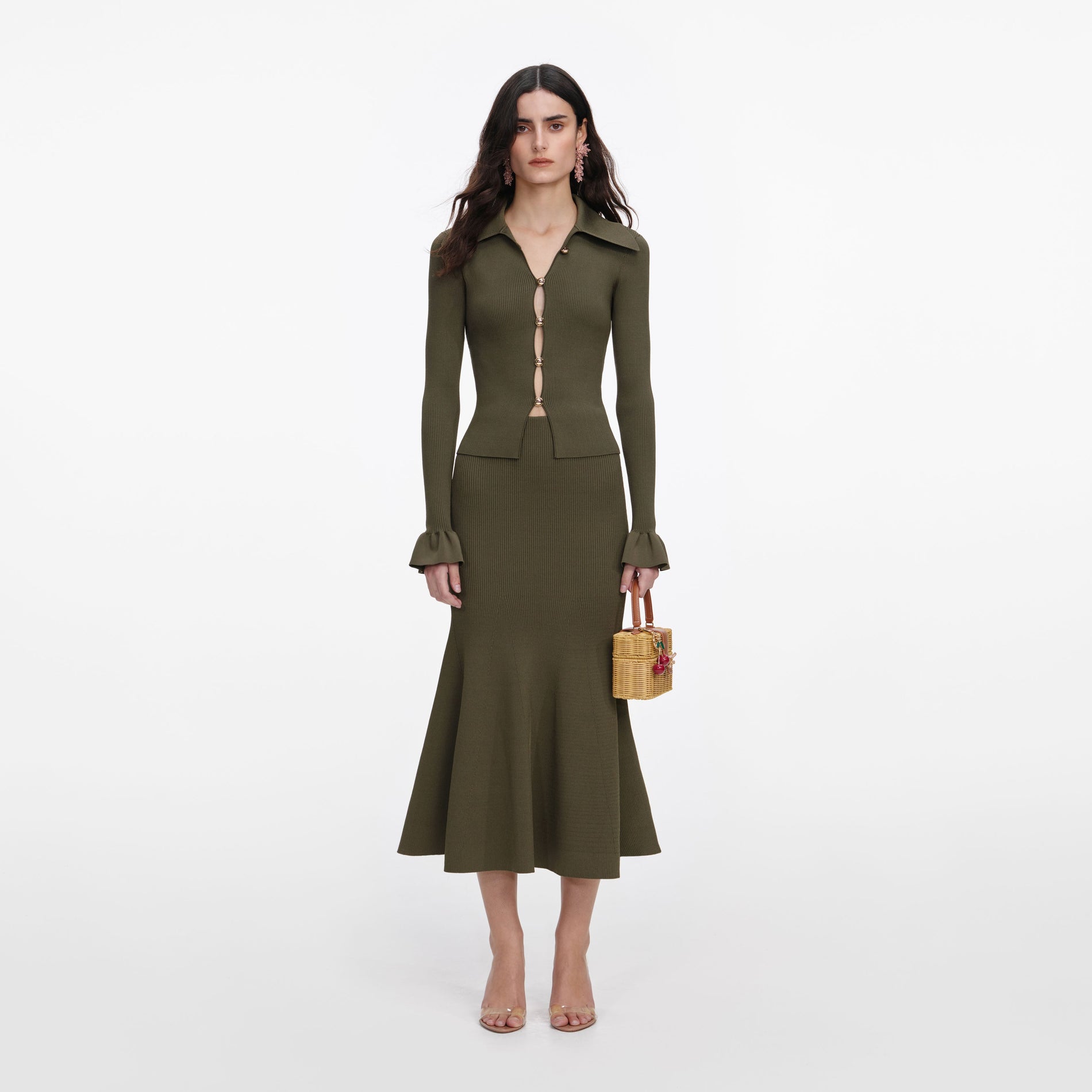 Front view of a woman wearing the Khaki Knit Midi Skirt